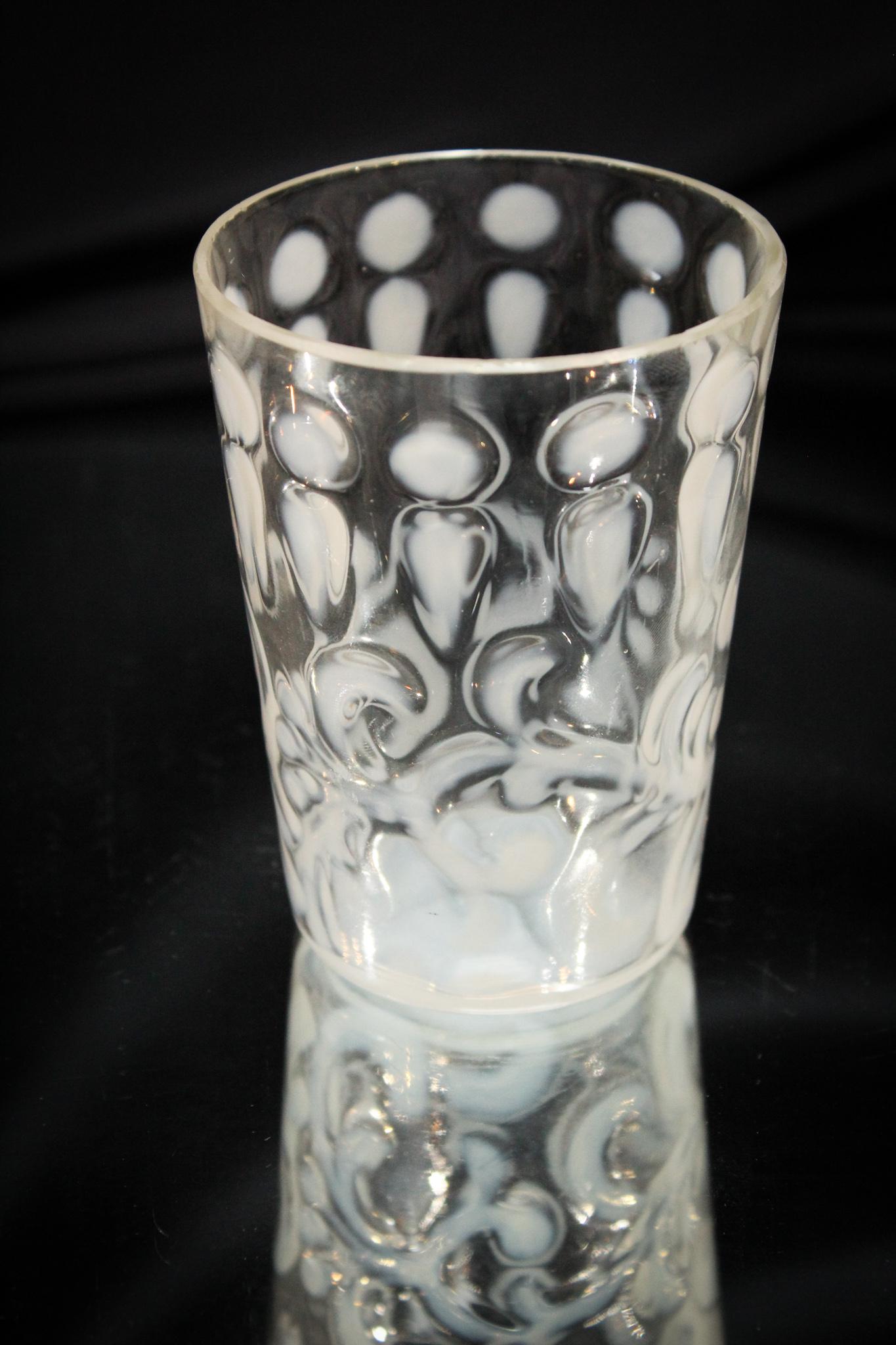 Opalescent Buttons & Braids Victorian Tumbler: Tuff to find if your collecting tumblers, this crystal opalescent example of the Buttons & Braids pattern is a great example. Strong opalescence. Great clarity. Measures 4" tall.