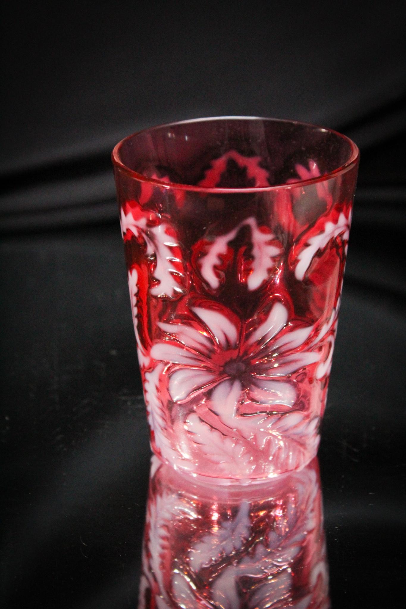 Cranberry Opalescent Northwood Poinsettia Tumbler: Saving one of the best for last, this is a goodie isn't it? Wow! A Northwood Cranberry opalescent poinsettia pattern Victorian tumbler. Quite the gem here folks. Measures 3 7/8" tall.