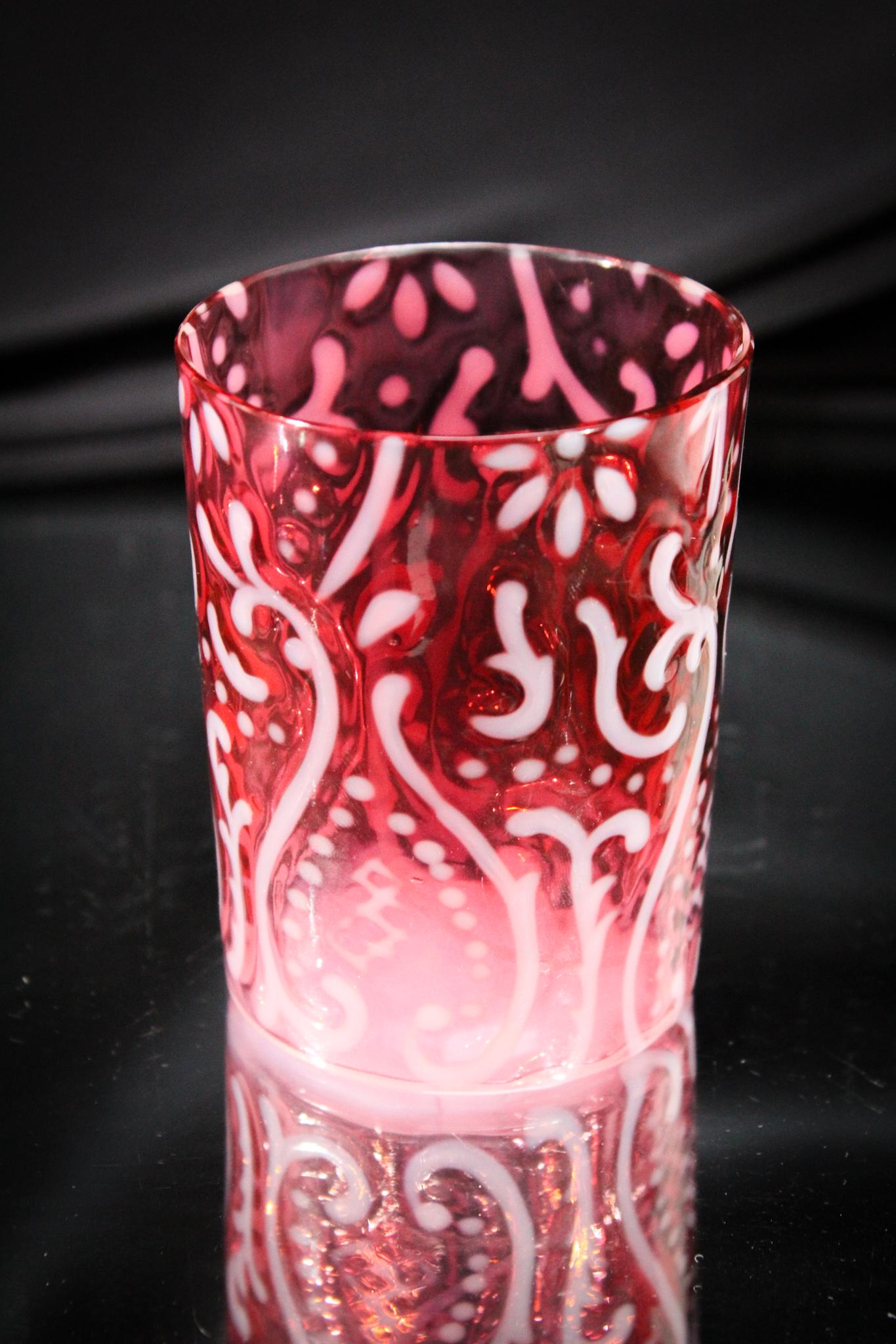 Cranberry Opalescent Arabian Nights Tumbler: Super example of cranberry opalescent Arabian Nights pattern. Deep rich cranberry color and bright opalescence. Measures 3 3/4" tall.