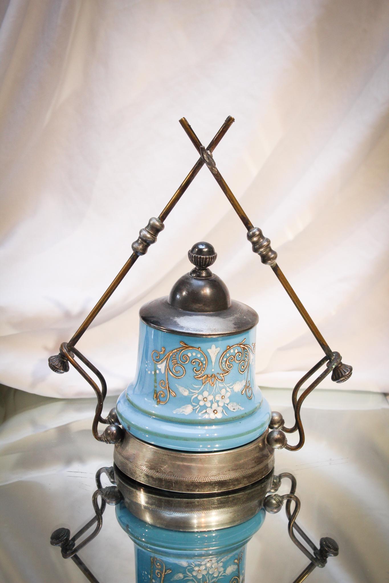 Blue Opaline Victorian Pickle Castor: Nice blue opaline glass decorated Victorian pickle castor. Clean example and one you just don't see. Measures 9" tall.