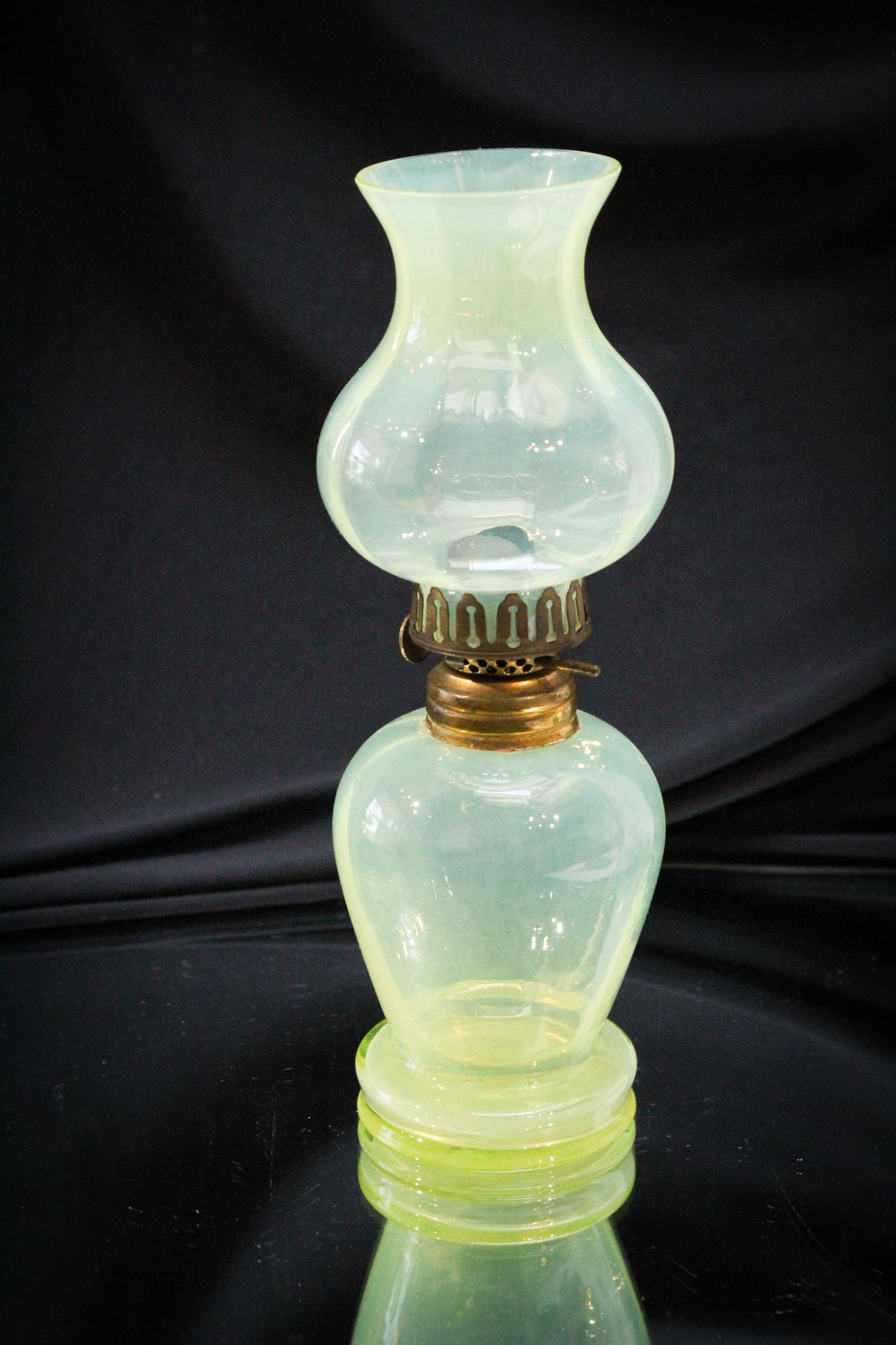 Vaseline opalescent Victorian Miniature Oil Lamp: We for a while thought this was a rare miniature oil lamp. We looked thru countless books and talked to collectors all over. We traveled around the world posing questions to all the "lamp authorities"
