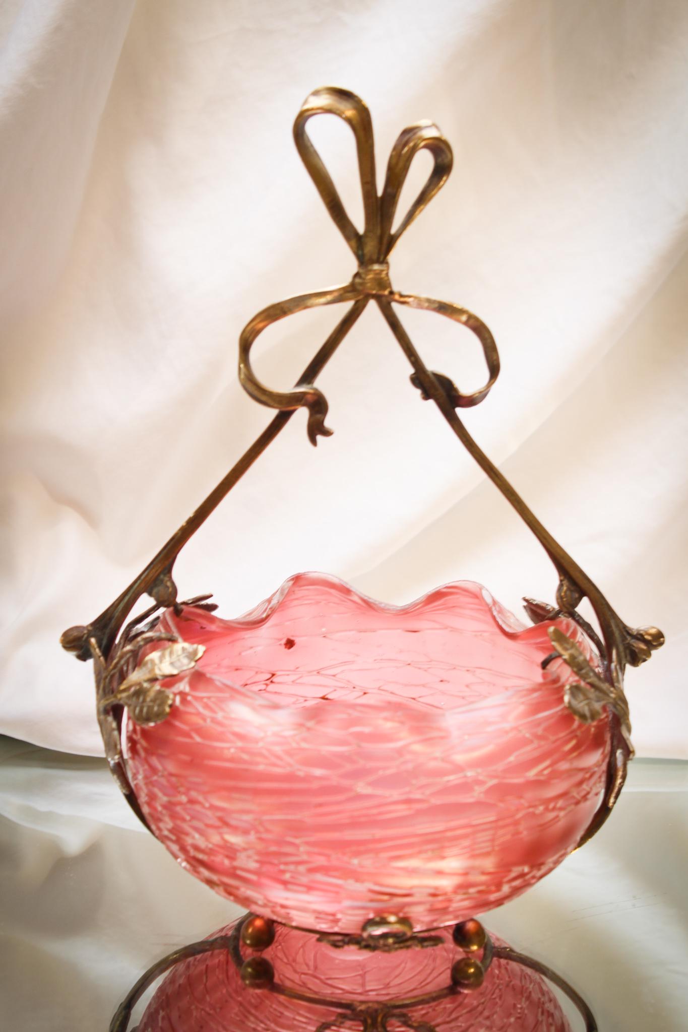 Loetz Chine Pink Bowl in Bronze Basket Frame: This piece is so nice. The form, the color, and the frame tops it off as being flat out beautiful. Over the top Art Nouveau piece. Circa 1897. Measures 11" tall