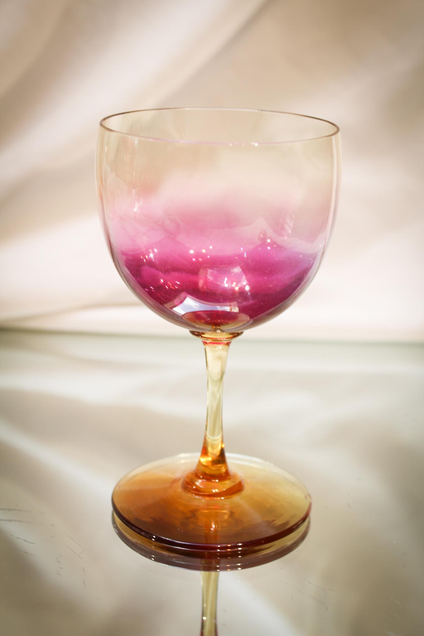 New England Victorian Amberina Glass Wine: Folks, this piece is beautiful. The glass is so thin and it rings like a bell. Polished pontil on the base. Excellent coloring. Measures 4 1/4" tall.