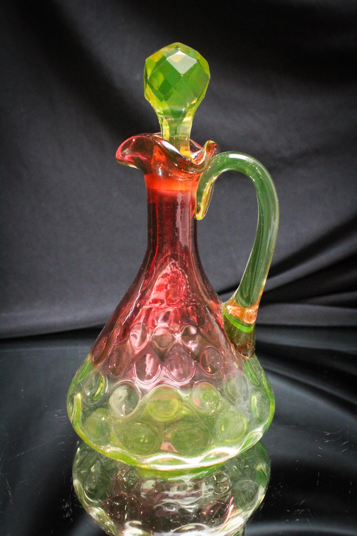 Hobb's Rubina Verde Victorian Glass Cruet: Do you have one of these folks? If so, well buy another. When it's a honey like this one, the more eye candy the happier you'll be. This one has great coloring and great form. Measures 6 1/2" tall.