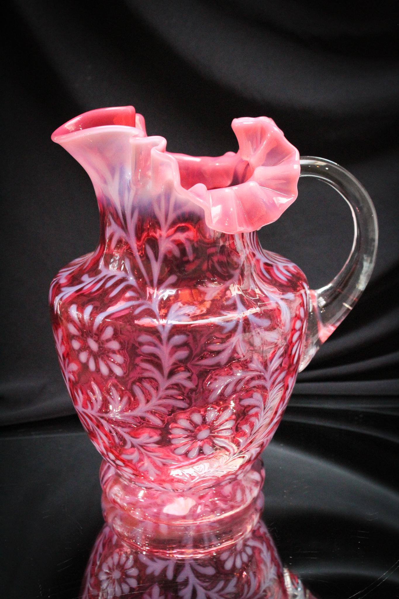 Northwood Cranberry Opalescent Daisy & Fern Water Pitcher: Always a beauty, these Northwood pitchers in cranberry opalescent just bring a smile to your face. This one is no exception. Rich cranberry coloring and fiery opalescence make this pitcher a piece to 