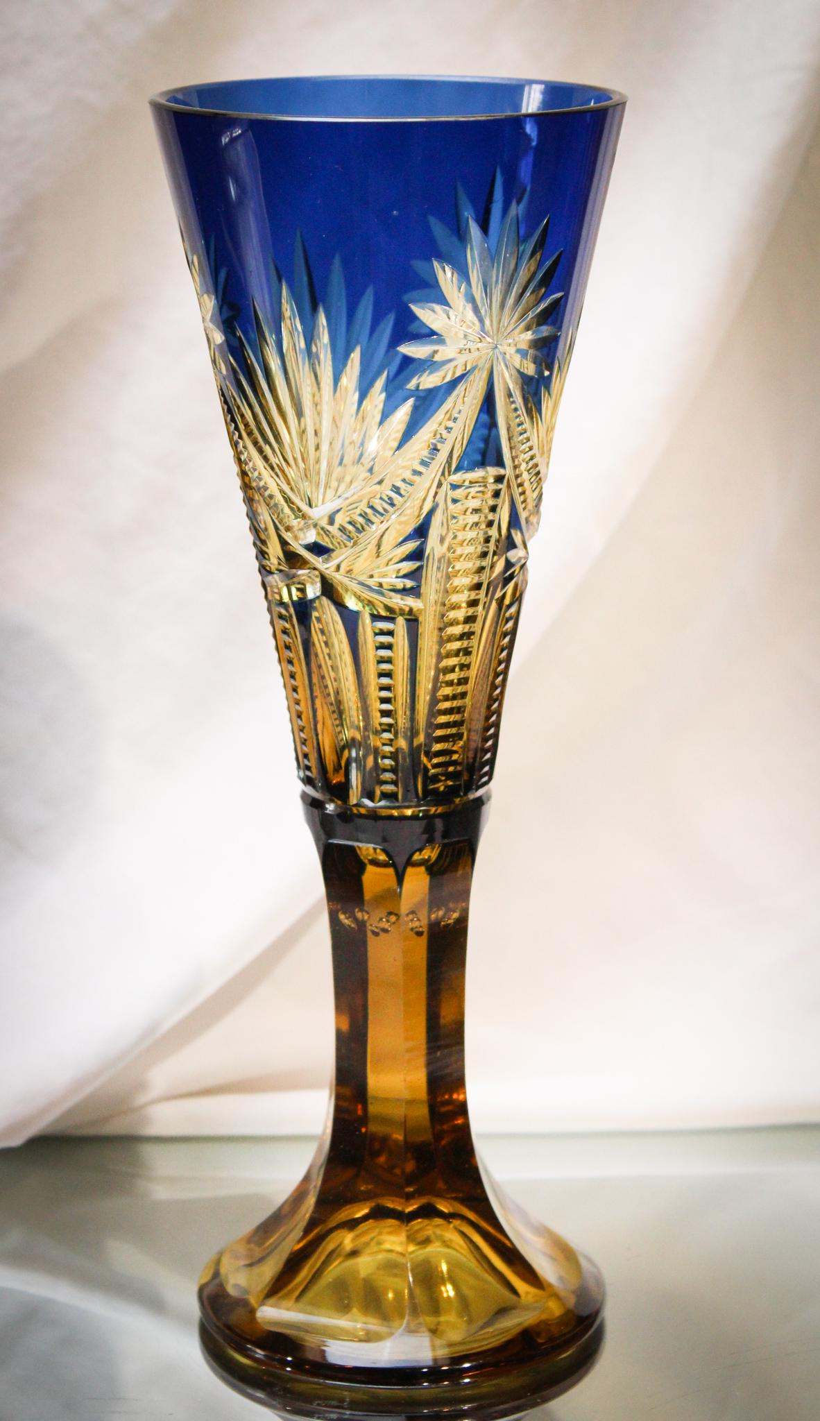 Cobalt Cut to Amber/Vaseline Glass 11" Vase: What a beauty the color combination of this vase is. Attributed to a Czech glass house, this young lady stands 11 1/4" tall. Cobalt cut back to an amber color that has a uranium vaseline glow. Quite a