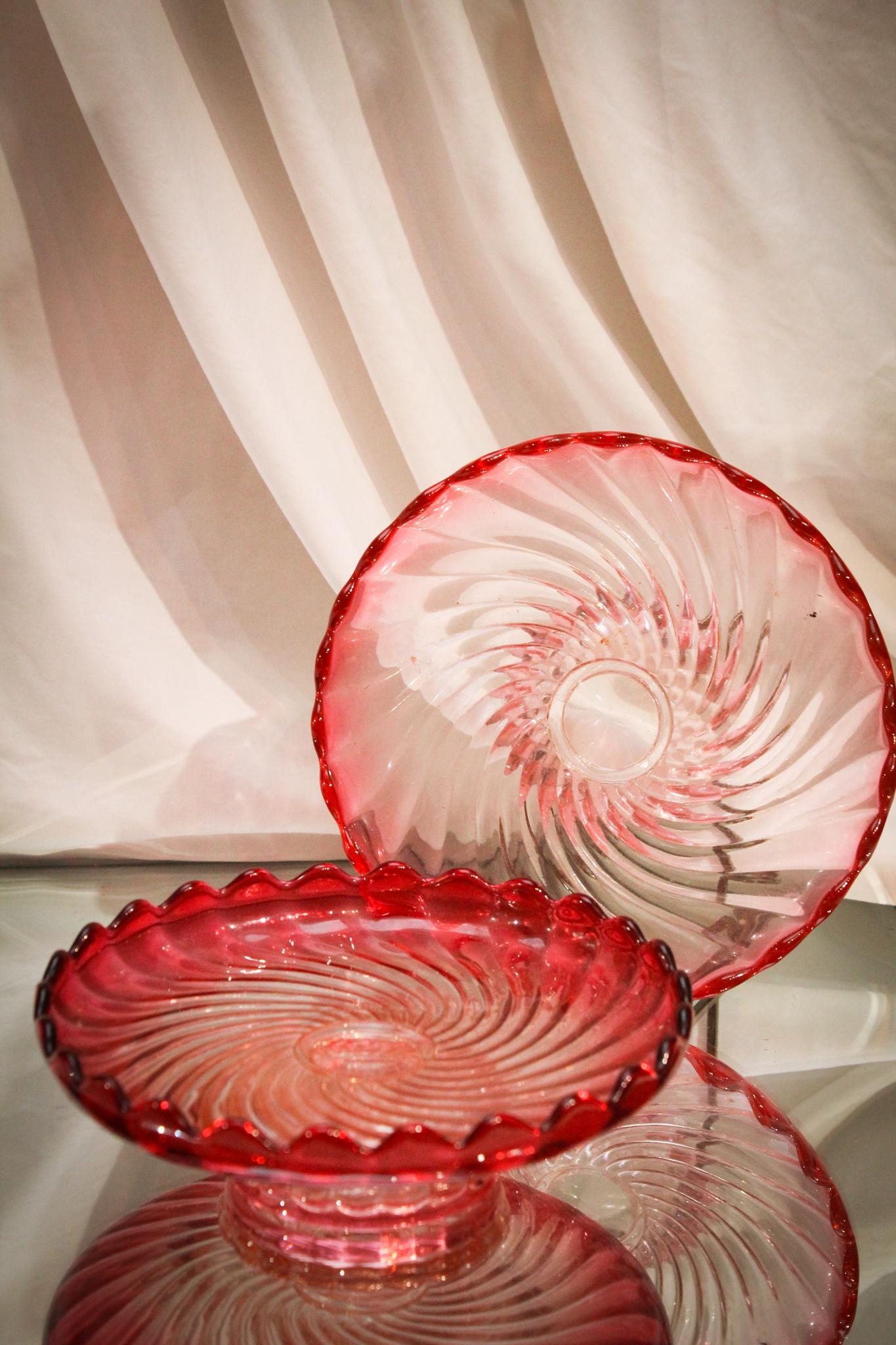 Baccarat Rose Tiente Pedestal Plateau pair: Pair of Baccarat Rose Tiente pedestal plateau dishes. True to rose tiente, these have the best color. Each measures 2" tall, 7" wide.