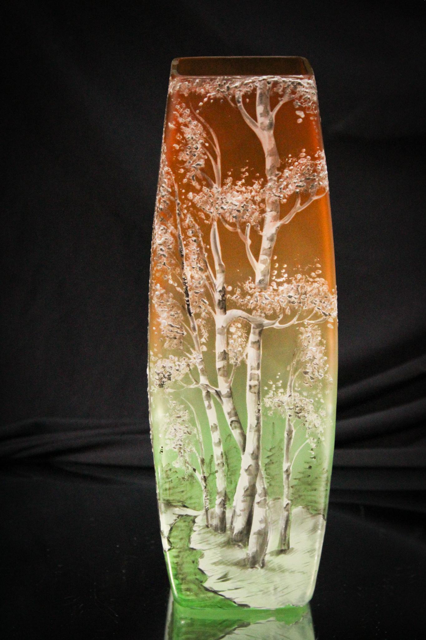Legras Vaseline Enameled Victorian Satin Vase: What a phenomenal piece of glass this is. Attributed to Legras, this vase shades in color from a bittersweet to vaseline and is heavily enameled with birch trees. Very showy and glows brilliantly unde