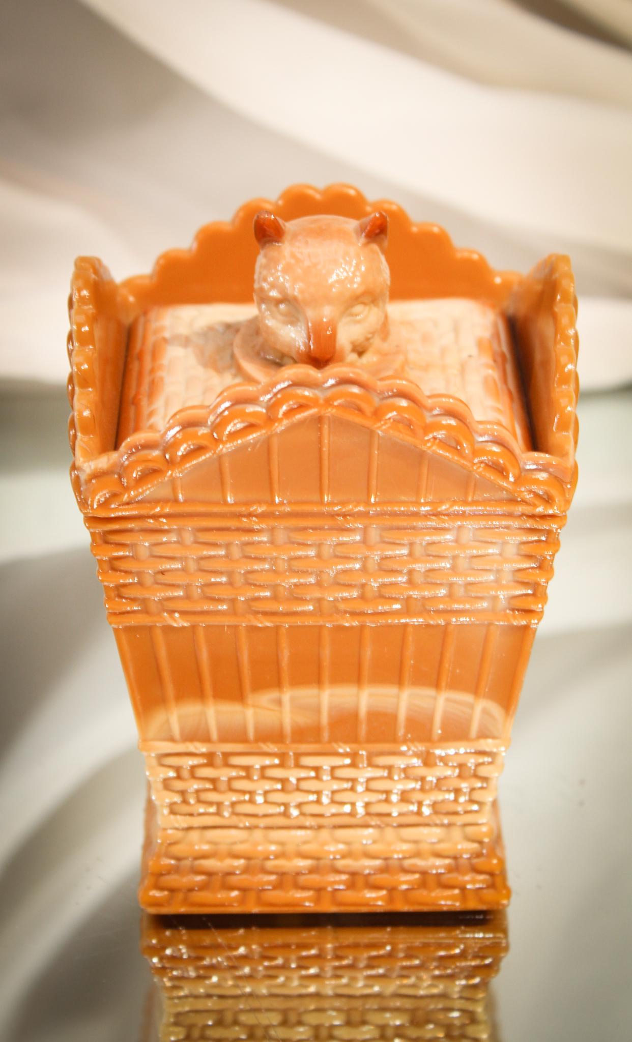 Greentown Glass Victorian Choclate Cat on Hamper: Wanted: New home for abandoned kitty. This little kitty needs a new home. Can you give it shelter in your curio cabinet? Sure, you can. Just one more critter. It won't eat much. This little guy measur