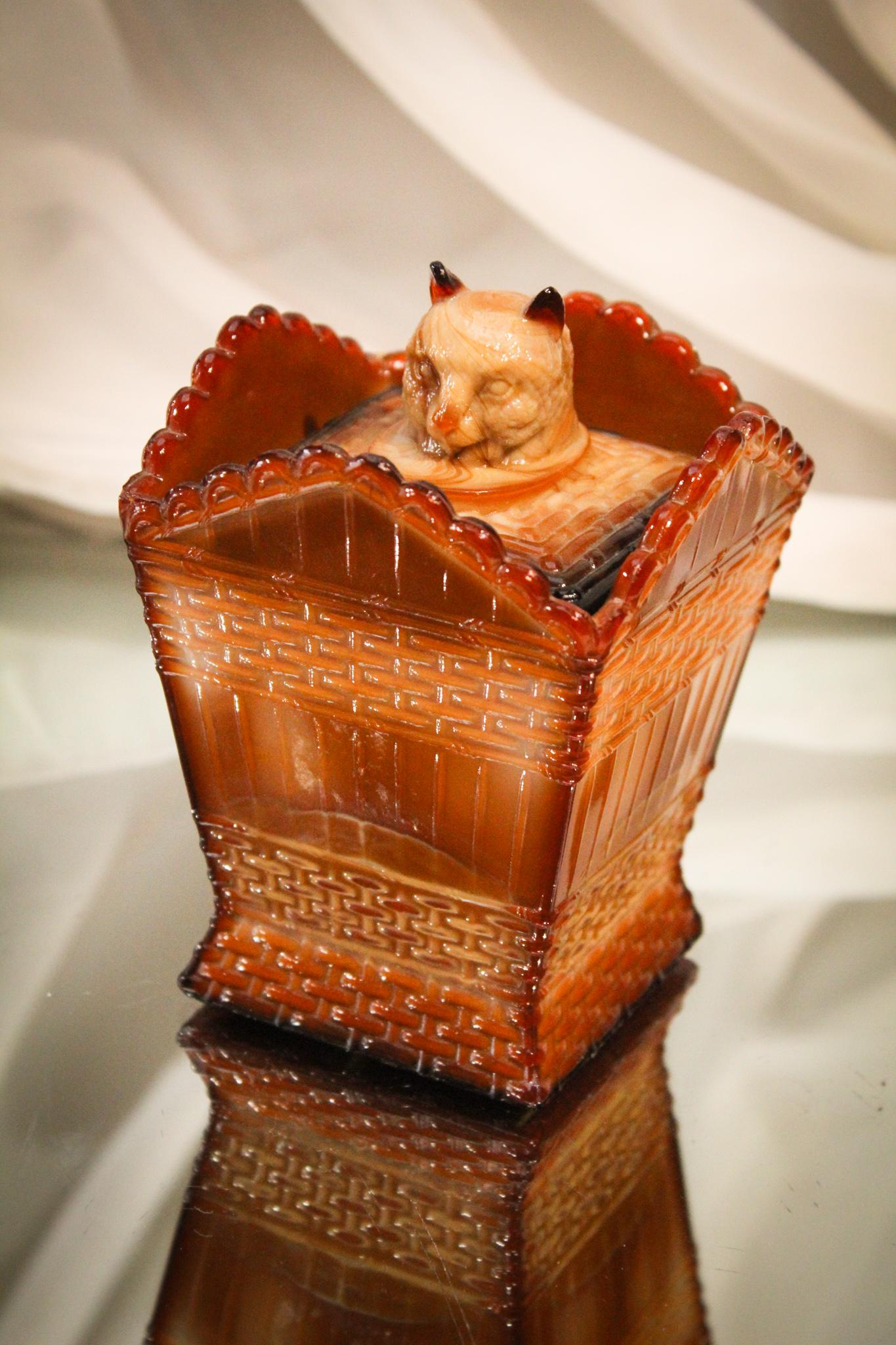 Greentown Red Agate Victorian Glass Cat on Hamper: This coloring is so pleasing to the eye. And what a nice form to see it on. Here's a Greentown cat on hamper in the ever popular red agate coloration. So rich. So pretty. Make room for the last of the