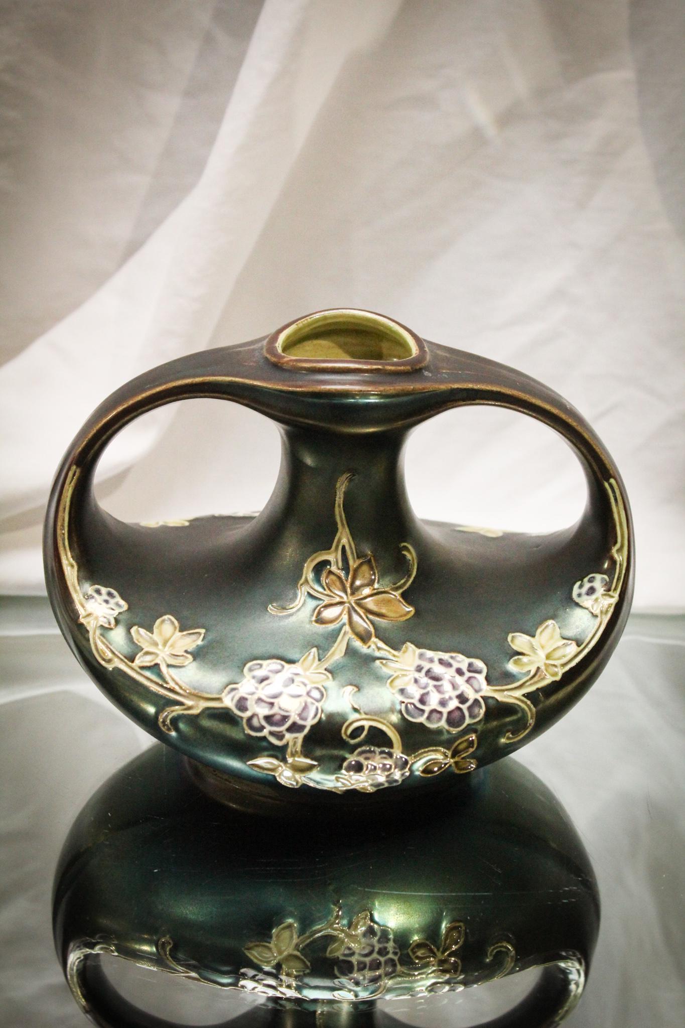 Amphora Porcelain Irridescent Vase: Amphora attributed porcelain irridescent vase. Lovely finish and such a nice Art Nouveau form. Measures 5" tall.