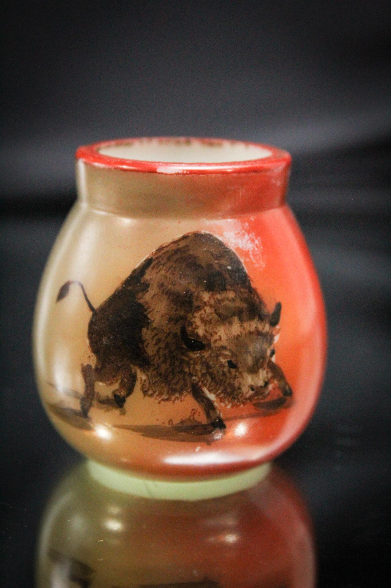 Handel ware Buffalo Victorian Toothpick Holder: This Handel ware Victorian toothpick holder has a buffalo on one side and the word "Toothpicks" on the back side. Nice coloring and highly sought after piece. Measures 2 1/4" tall.