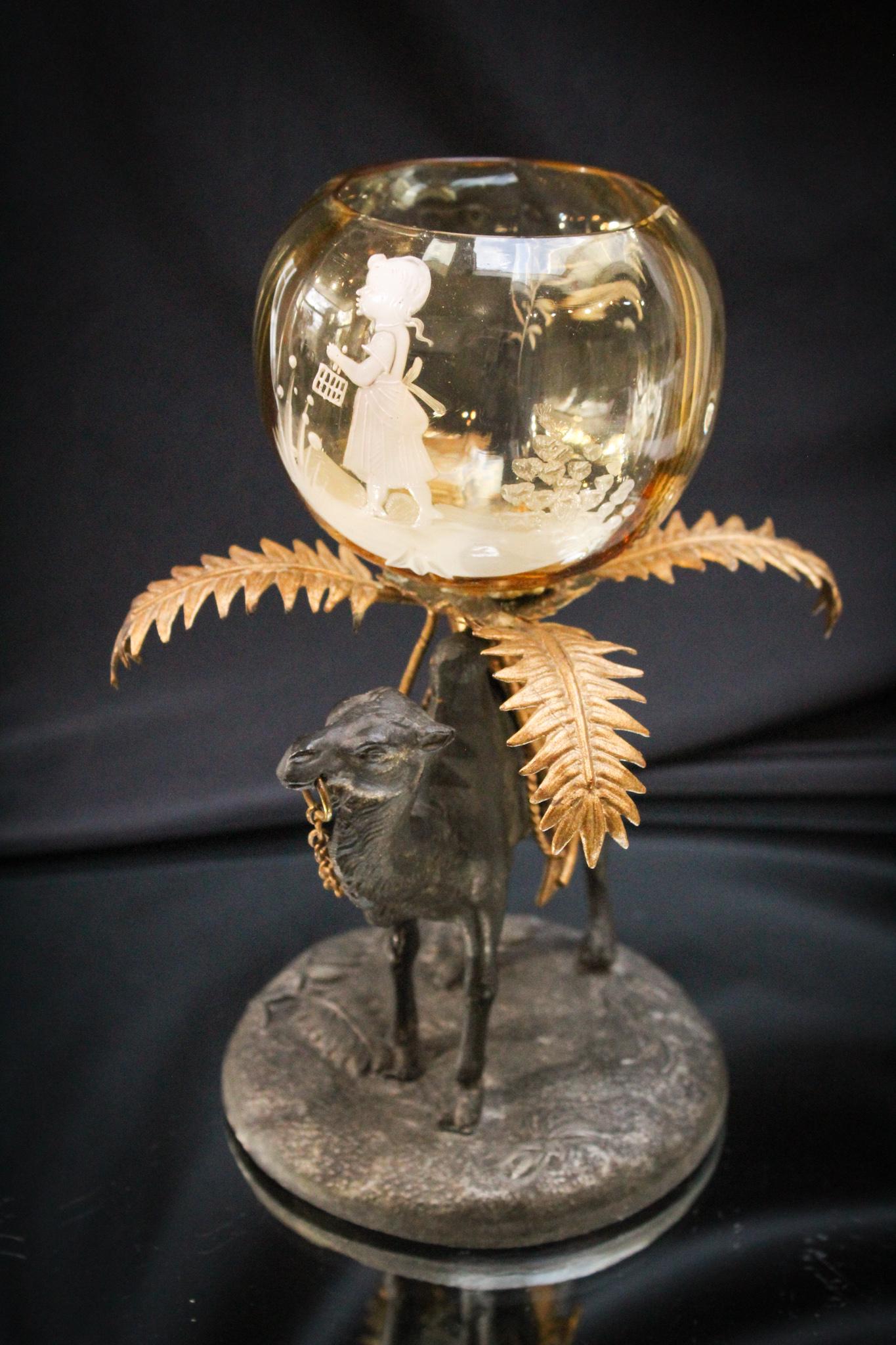 Spelter Camel figural Mary Gregory Victorian Rosebowl: What a fantasy piece this is! Who could have imagined a Mary Gregory decorated rosebowl atop an egyptian camel along with palm fronds. We couldn't have. What an unusual, yet attractive piece this litt