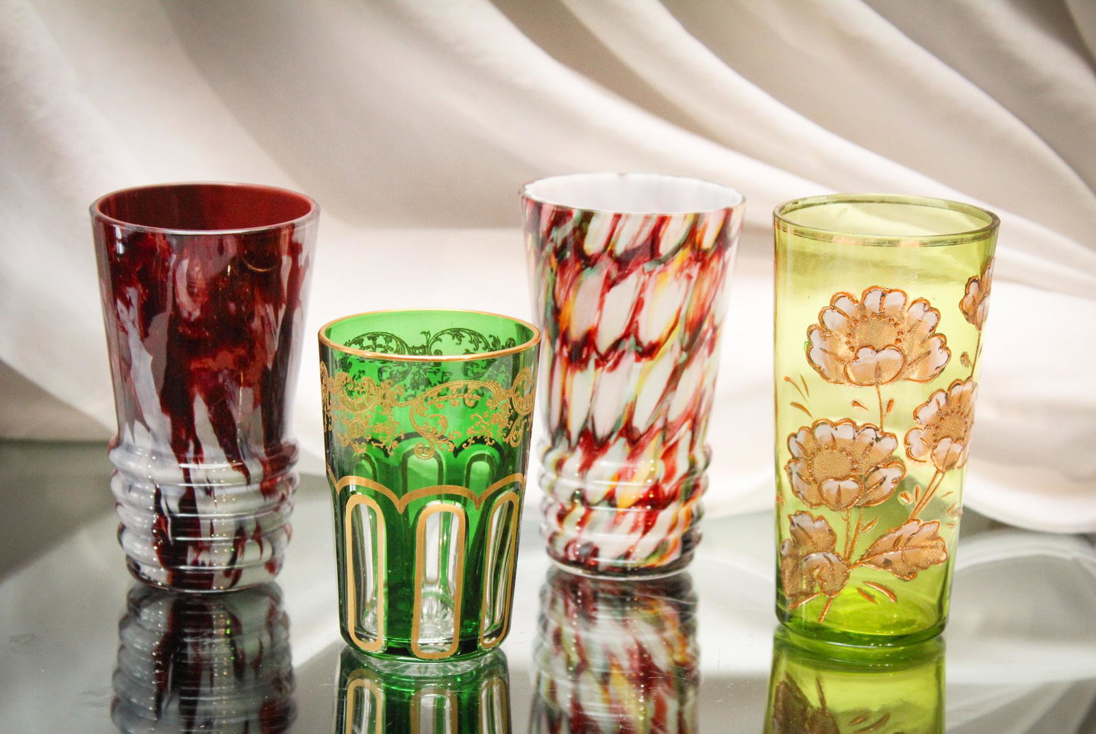 4 pc Lot Victorian Juice Tumblers: Can you believe these? How wonderful. An assortment of four Victorian juice tumblers in various colorations. So pretty. Take your pick. Just kidding. You get them all! tallest measures 4 1/4" tall.