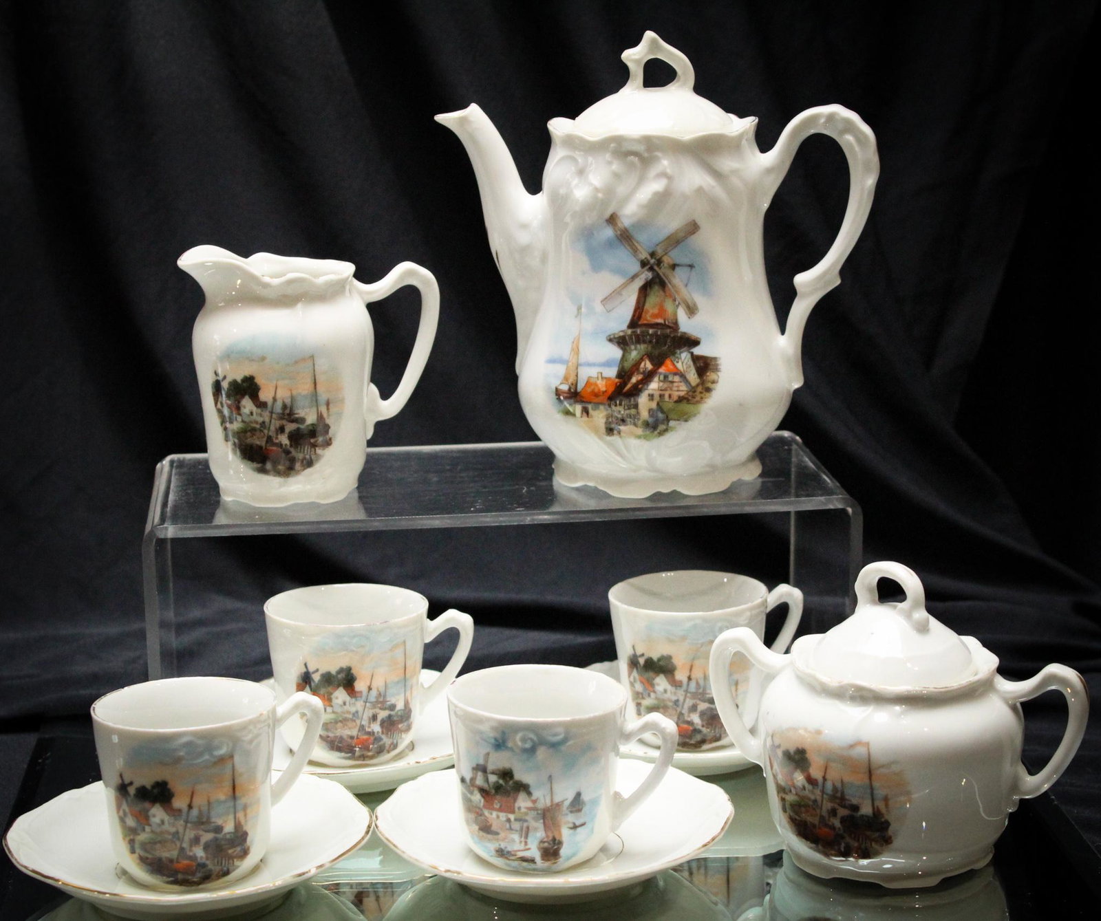 Victorian 9 pc Scenic Structures Dutch dÃ©cor Child's Tea Set: Ever-so-nice windmill dÃ©cor and scenic structures decorate these cuties perfect for children's and doll collectors alike. Tallest piece measures 6" high.
