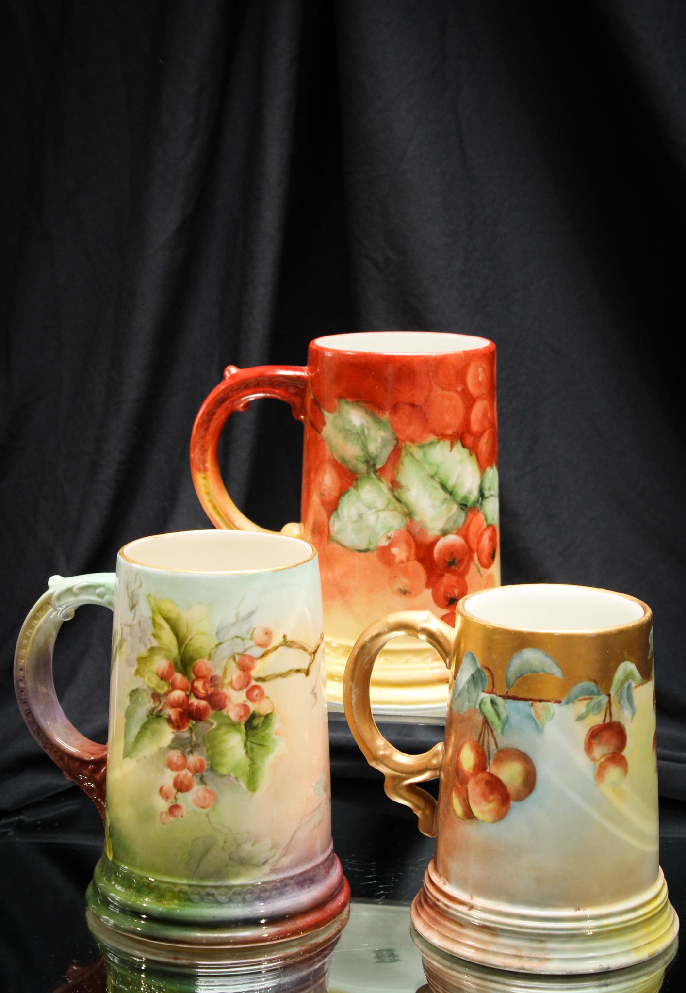 Lot of 3 Victorian France Limoges Belleek Porcelain Mugs: Well, we do have to say we have a super array of hand-painted porcelain in this auction! Fine examples like these don't come along often. So nice! Tallest measures 5 1/2" high.