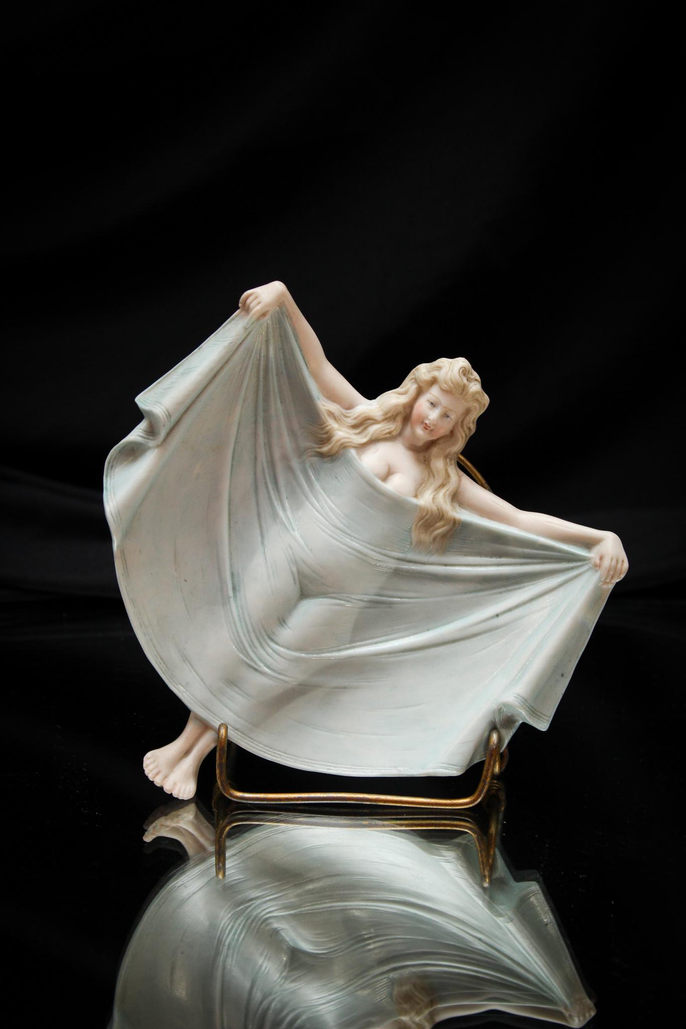 Bisque Risque' Female Nude Card Tray: Oh, you'll get an eyeful if you turn her over. Whoops, we did. Nice bisque risque' card tray. She has it all going for her and then some. Measures5 1/2" by 5 1/2".