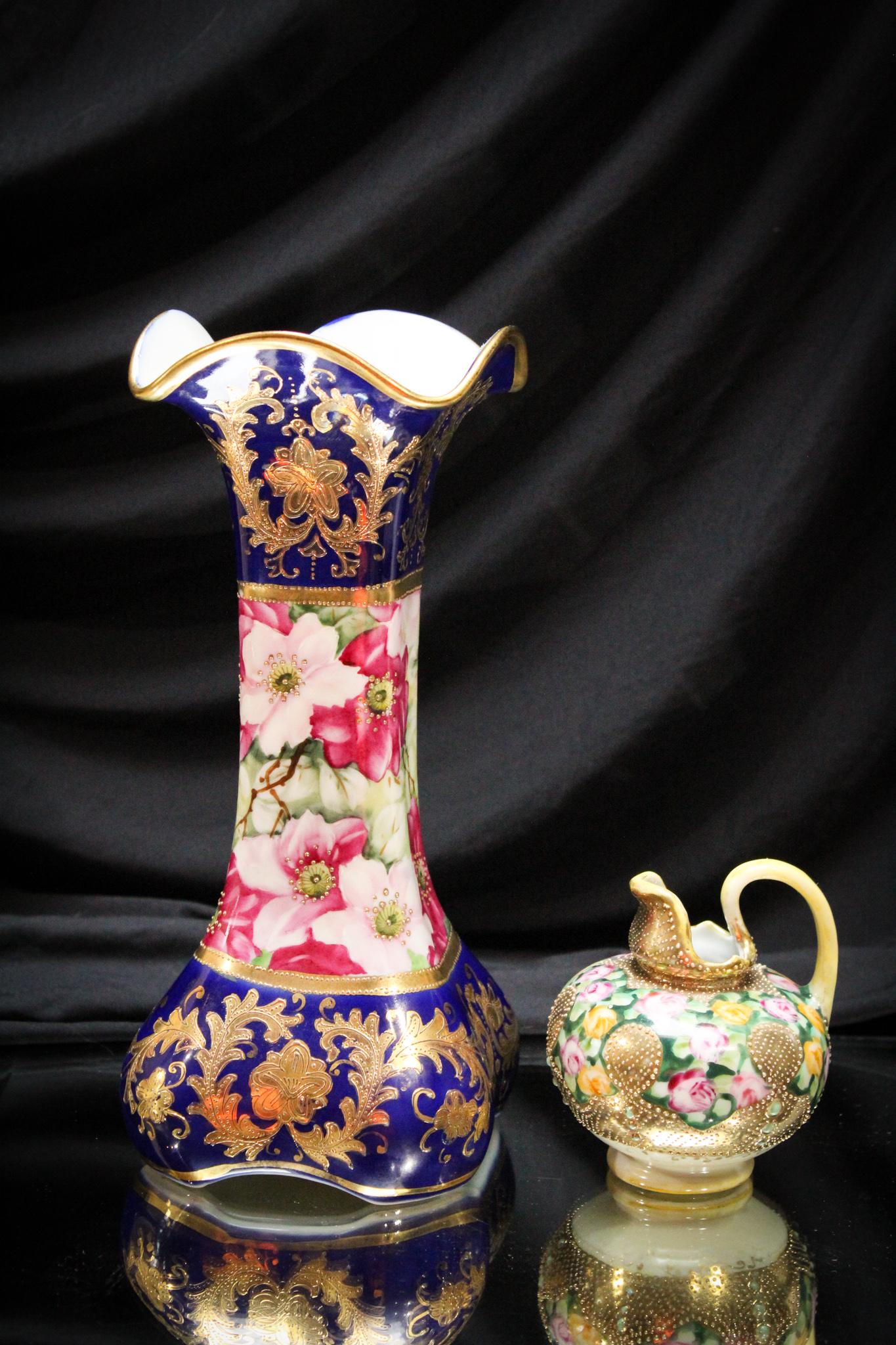 2 pc. Lot Porcelain Cobalt Decorated & Nippon: Pretty pairing here of a cobalt and gold decorated vase and a Nippon small jug. Largest measures 10".