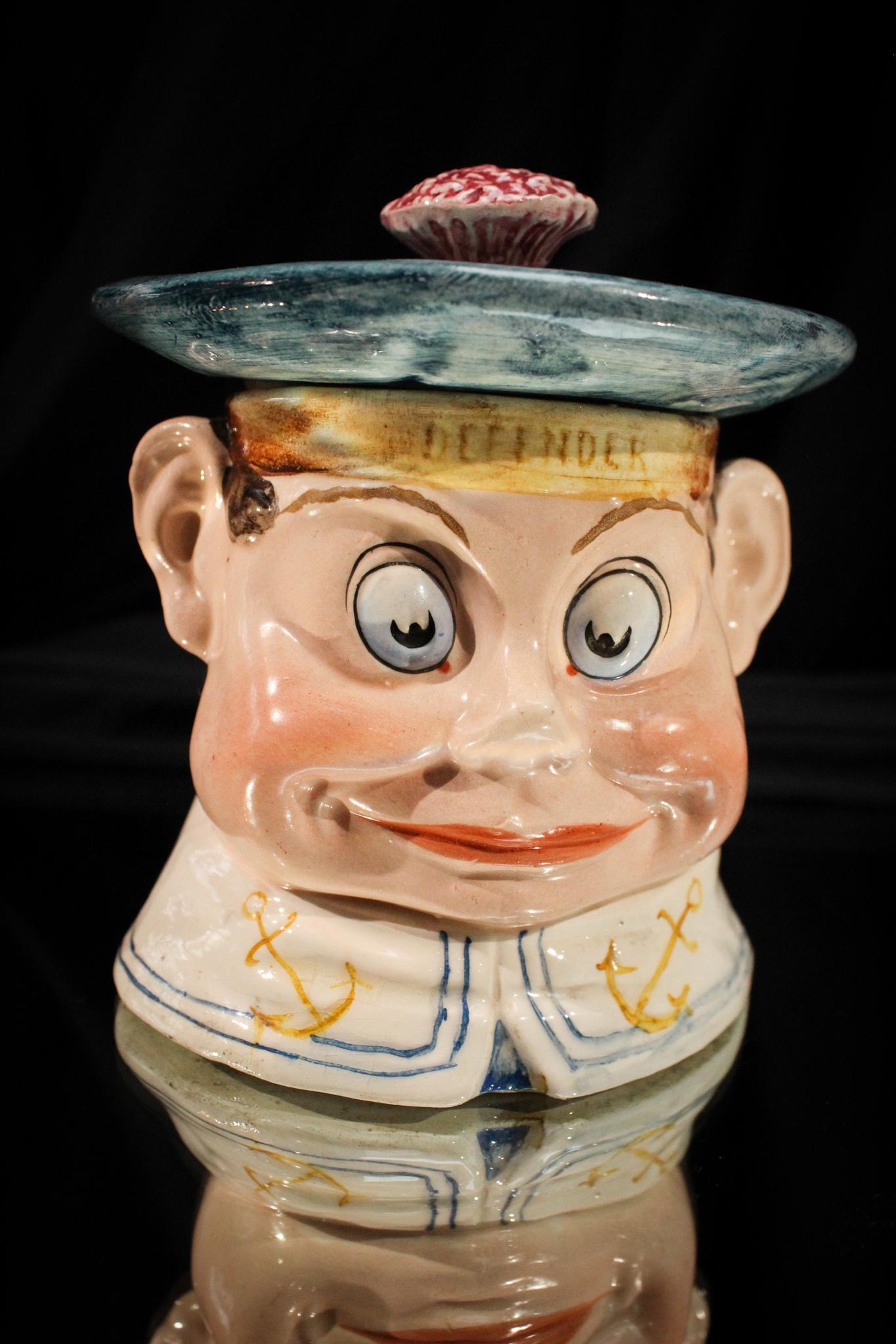 Victorian Palmer Cox Brownie Majolica Humidor: We love the Palmer Cox Brownies! These gender-neutral creatures were popular in children's books in the Victorian era, and yet still are today. Who couldn't love them? This example is executed in majo