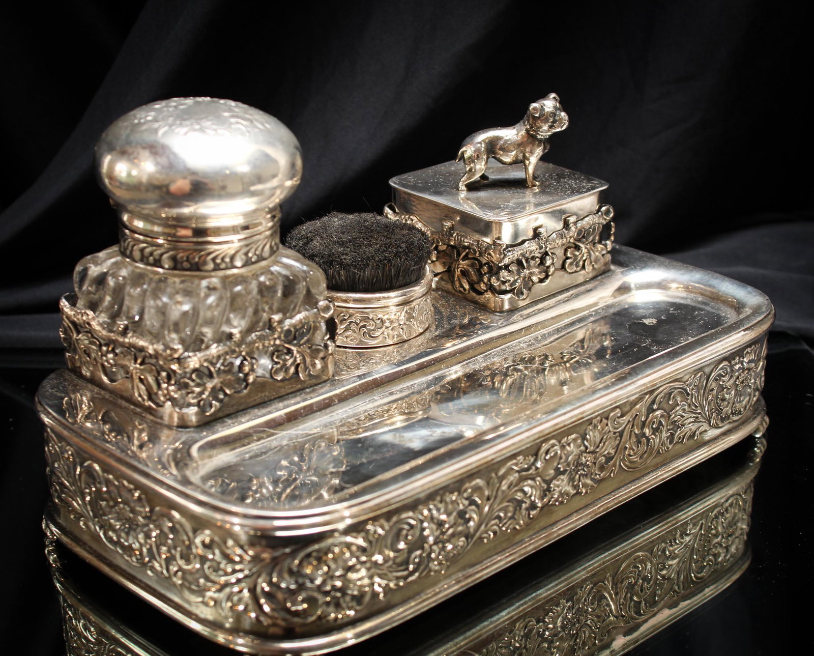 Victorian Pairpoint Silverplate Inkwell Desk Set: Stunning Victorian Silverplate signed Pairpoint desk set. Set is comprised of tray, quill brush, stamp box and inkwell. Very nice and large, measuring 4 1/2" by 9".