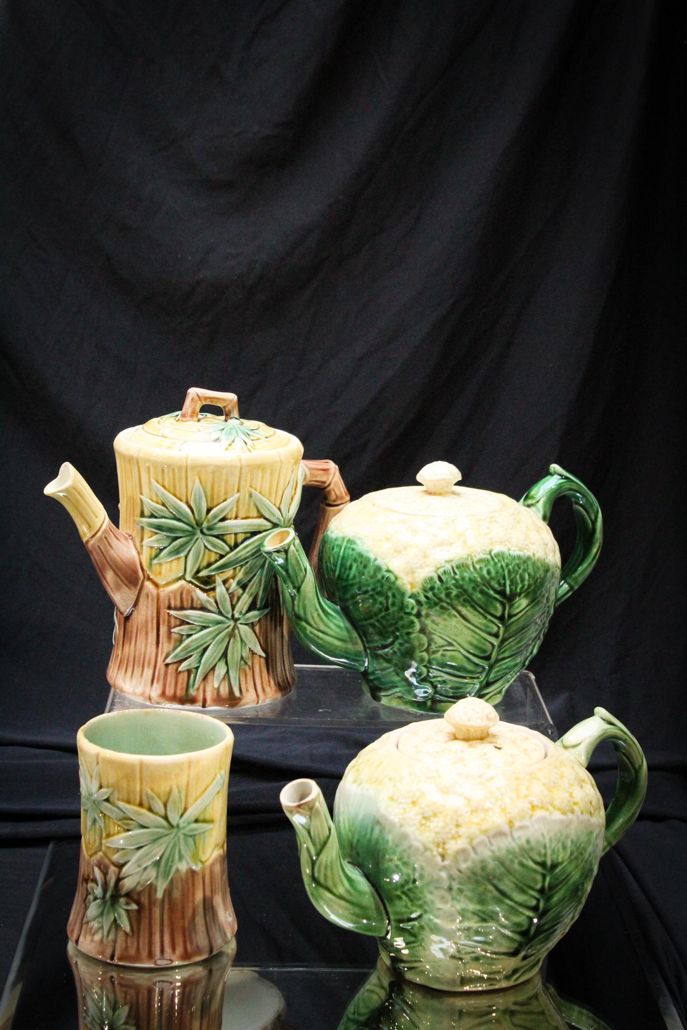 4 pc Lot Victorian English Majolica Etruscan Majolica: Time for tea here folks! Yes, we are offering two Etruscan Victorian English majolica pottery teapots in the form of a head of cauliflower and also a bamboo pattern spooner and teapot. Both also Etrus
