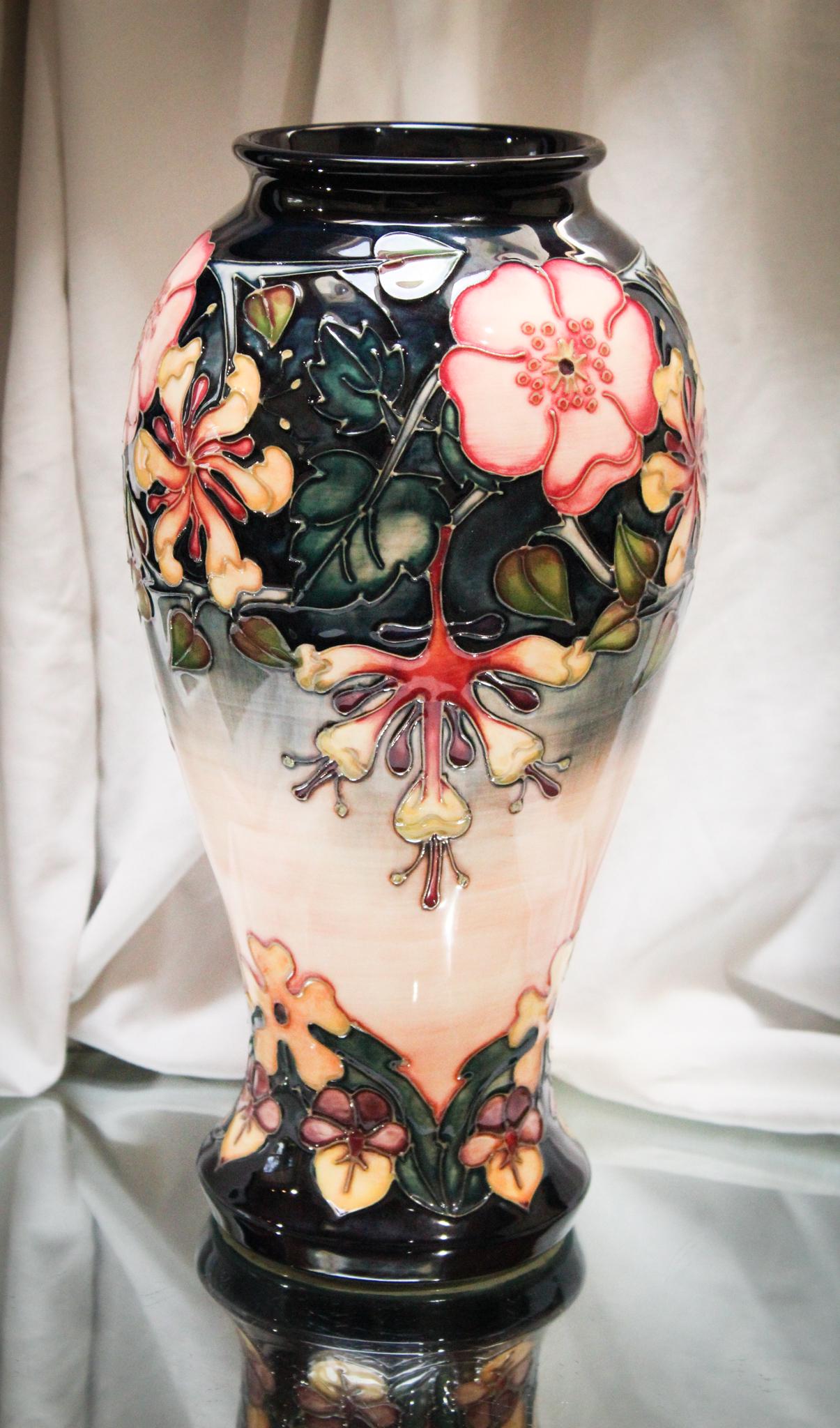 Large 12" Moorcroft Pottery Vase: Quite large measuring in at 12 1/2" tall Moorcroft pottery floral dÃ©cor vase. Nice coloring and size to this one folks.