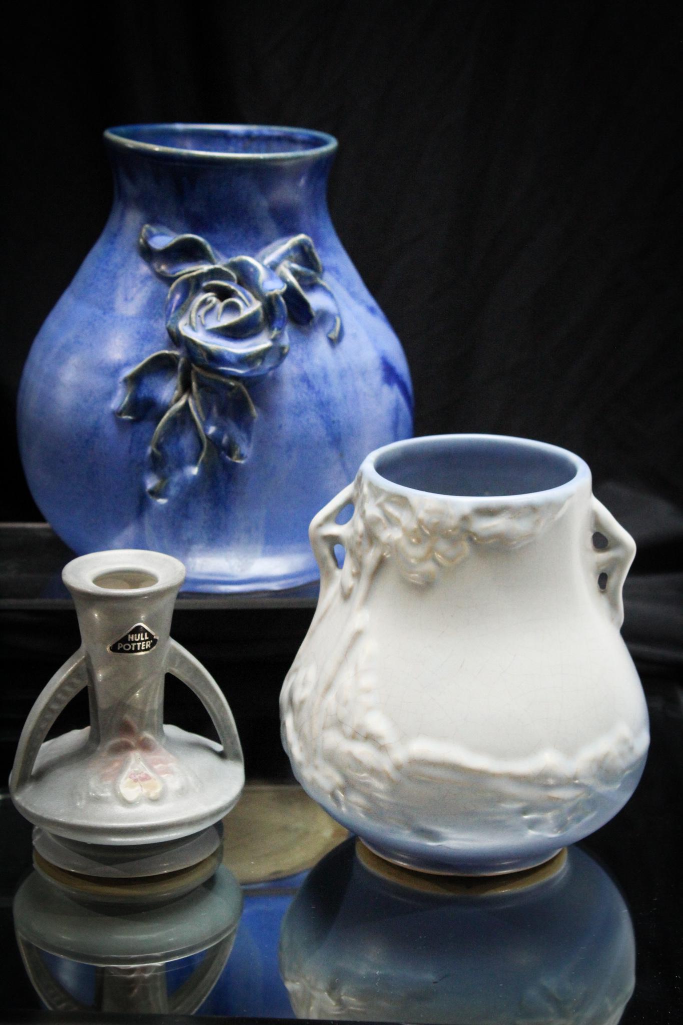 3 pc Lot Fulper Weller Hull Pottery of Vases: Nice assorted offering of various makers including Fulper, Weller, and Hull. Largest measures 7" tall.
