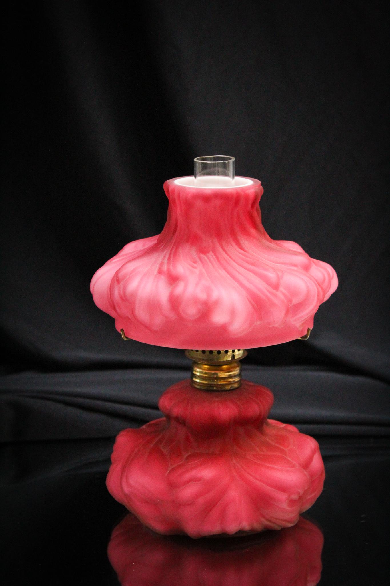 L.G. Wright Wild Rose Plume Miniature Oil Lamp: This is a beauty, folks! The color is amazing and we love the plume pattern. Such a nice lamp. Measures 7" tall.