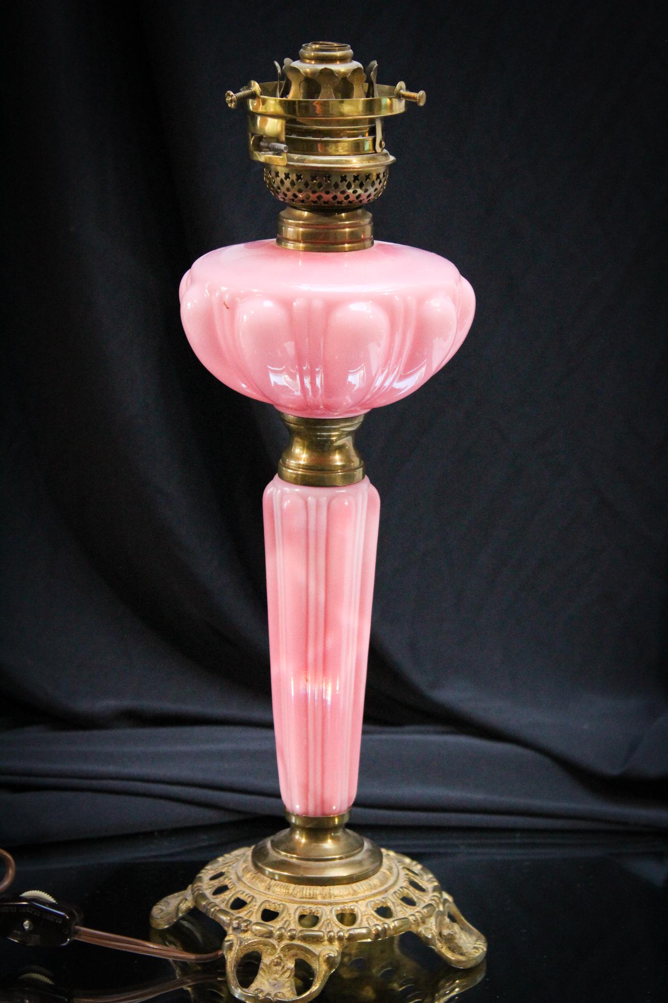 Consolidated Pink Bulging Loop Miniature Oil Lamp: What a wonderful shade of pink the glass is on this Consolidated Bulging Loop pattern miniature oil stand lamp. Great piece for any collector. Measures 11" tall.