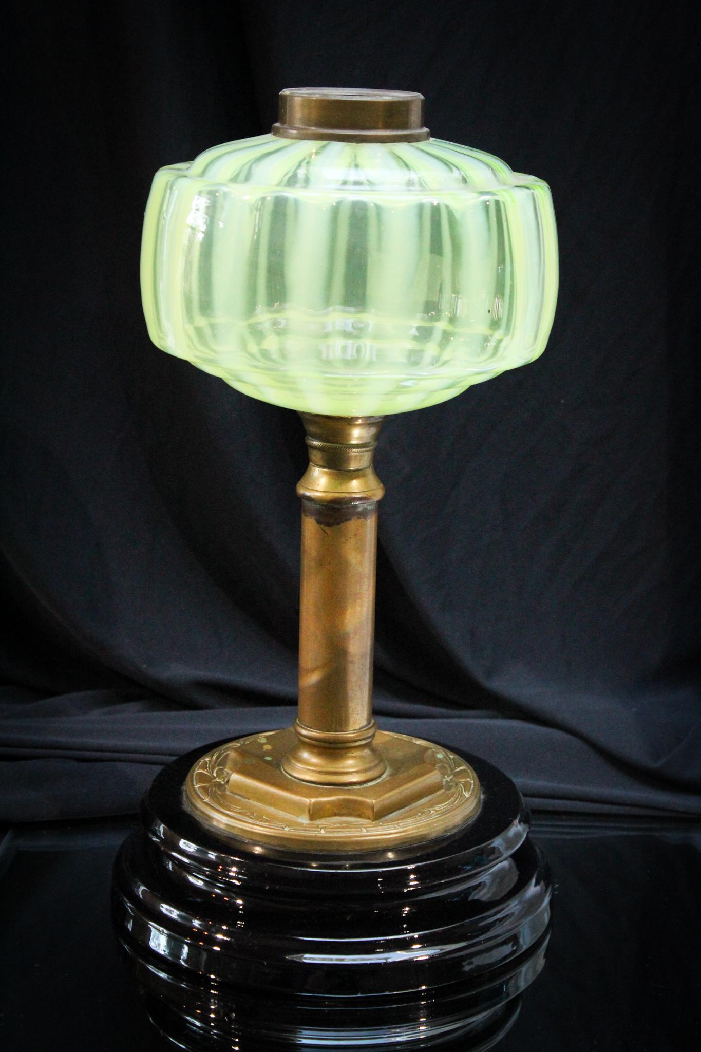 Vaseline Opalescent English Stand Lamp: Boy does this puppy glow when you put a black light to it! Better wear your sunglasses for this gem! Wonderful vaseline opalescent stripe oil lamp. Measures 13 1/2" tall.