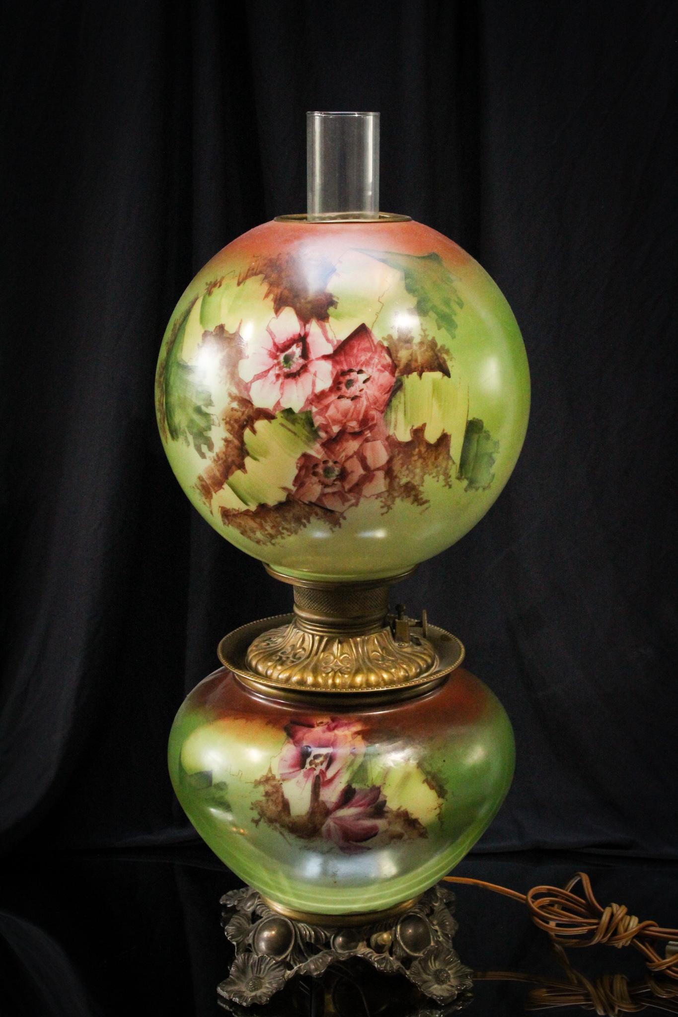 Fabulous Victorian Gone With the Wind Oil Parlor Lamp: Folks look at the rich green coloring on the background of this lamp with the floral dÃ©cor showcasing begonia flowers. Nice lamp measuring 22" tall.