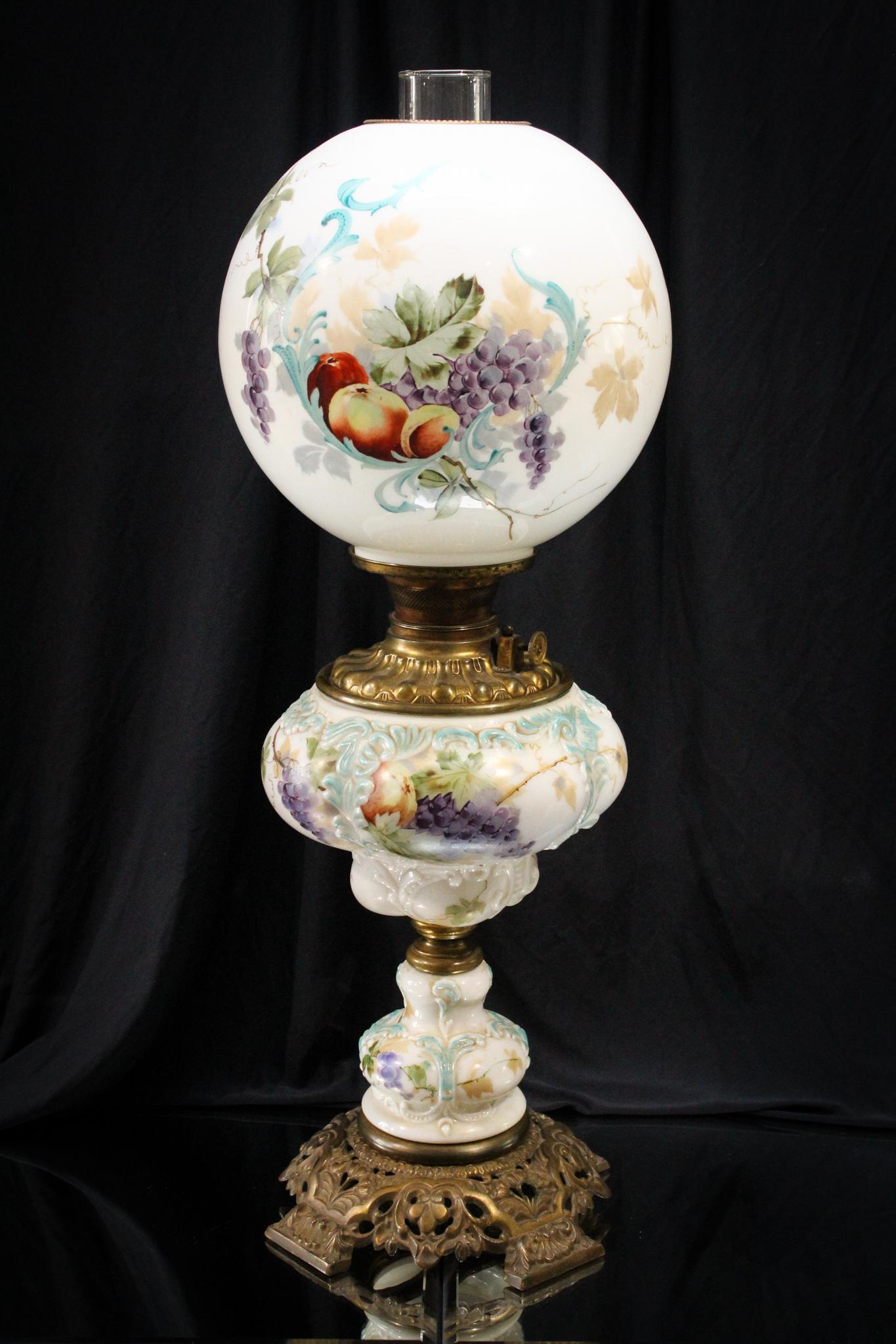 Rare Consolidated Gone With the Wind Parlor Oil Banquet Lamp: Such a rare lamp and unusual decoration of fruits. Nice! This lamp by Consolidated glass is an unusual find and has embossed pattern and array of fruits to the decoration. Incredible banquet lamp. Mea