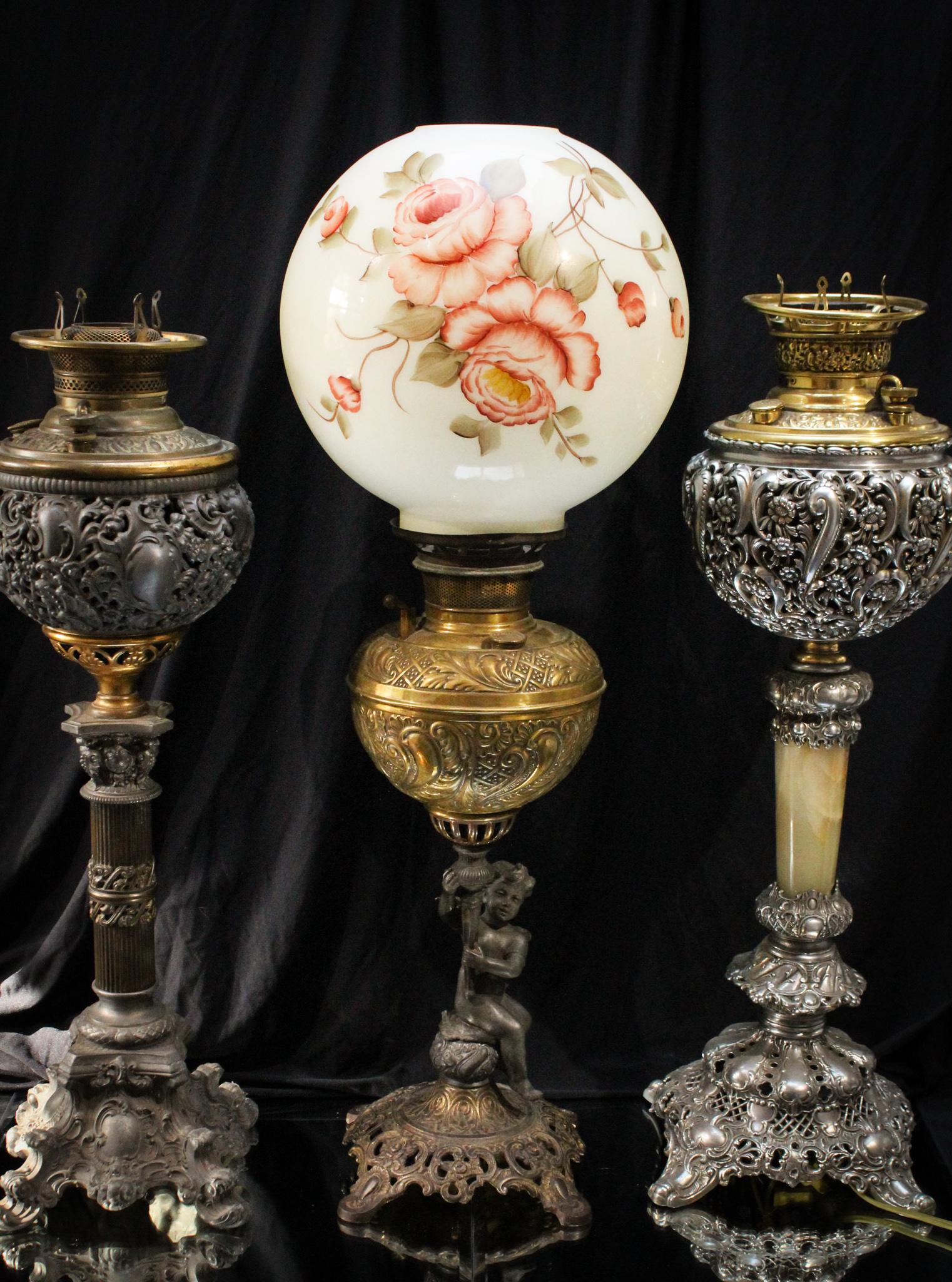 4 pc. Lot Victorian Banquet Lamps & More: Another fine offering of 3 Victorian banquet lamp bases and the addition of a hand painted ball shade. So much for the taking here, folks! Largest measures 27" tall.