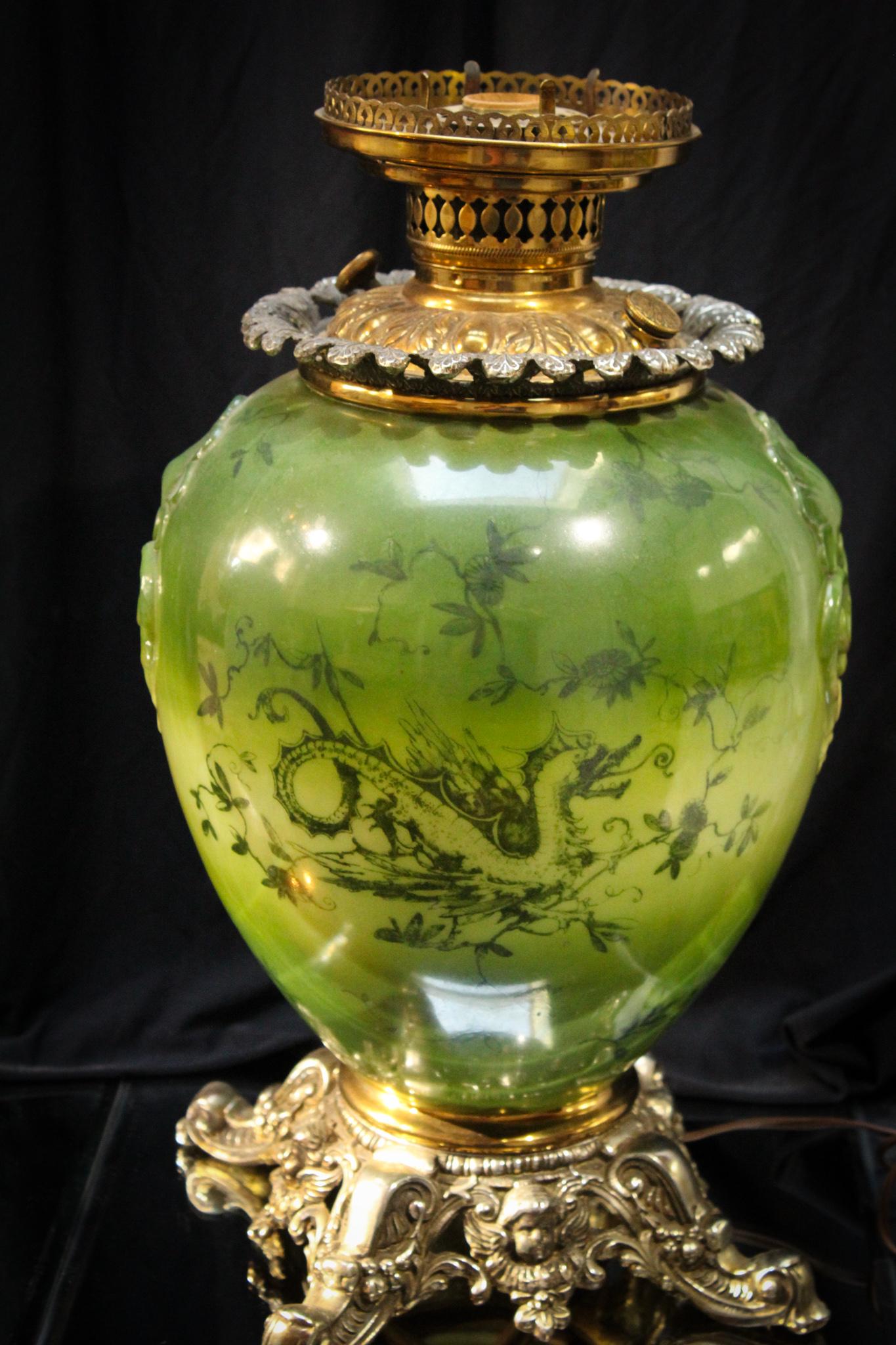 Massive Victorian Parlor Oil Lamp Base w/ Dragons: Folks, if you are a size queen and love lizards, this massive dragon lamp is just the thing to make you happy. Large green lamp base with ornate brass hardware and dÃ©cor of dancing dragons makes th