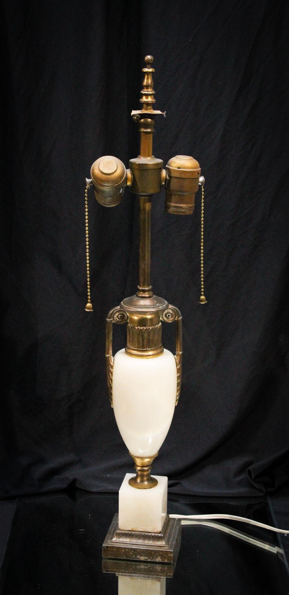 Antique Art Deco Onyx Table Lamp: Beautiful Art Deco table lamp from the 1920's. Orignal mountings and hardware. Nice piece and all original. Measures 22 1/4" tall.