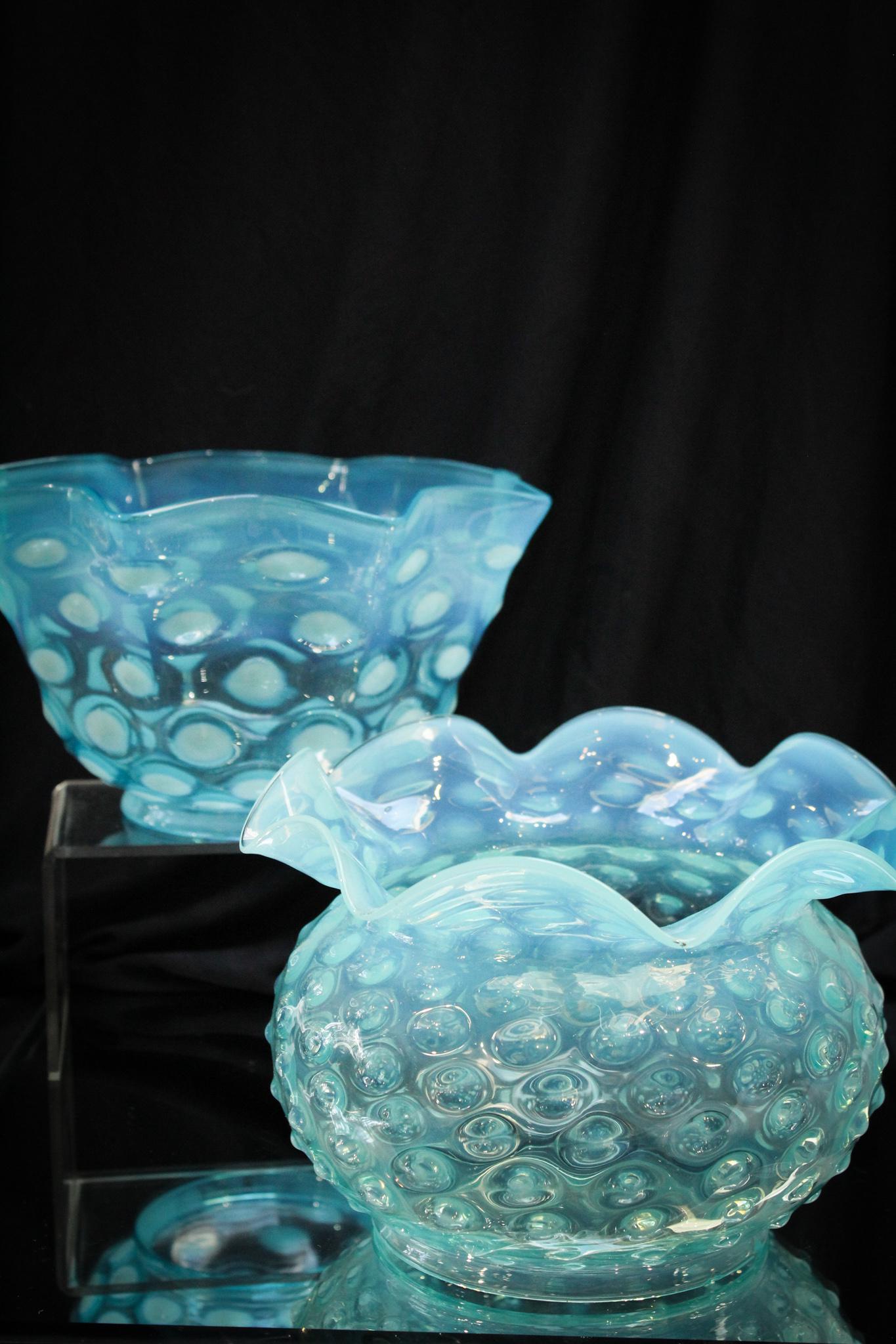 2 pc. Lot Victorian Blue Opalescent Glass Gas Shades: Another great lot of two Victorian gas shades in blue opalescent glass- one hobnail example and one bullseye example. Largest measures 5 1/2" tall, 8 1/4" in diameter and 4 7/8" fitter rim diameter.