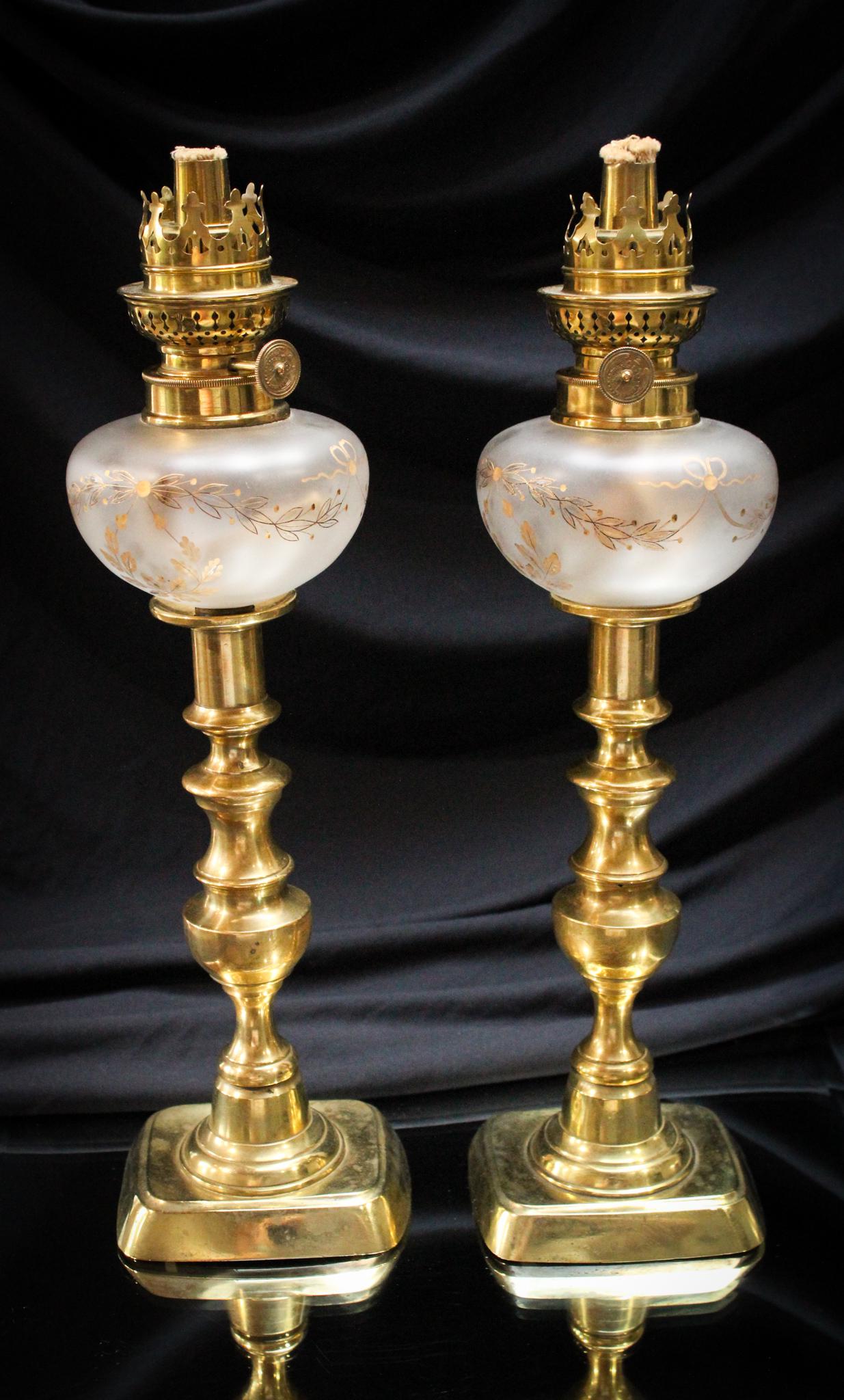 Pair Victorian Gilt Brass Peg Oil Lamps: What is better than one lamp? Well, a matched pair, of course! That's what we have here, folks! Each lamp features gilt decoration on a frosted background. Completed by original brass burners on brass