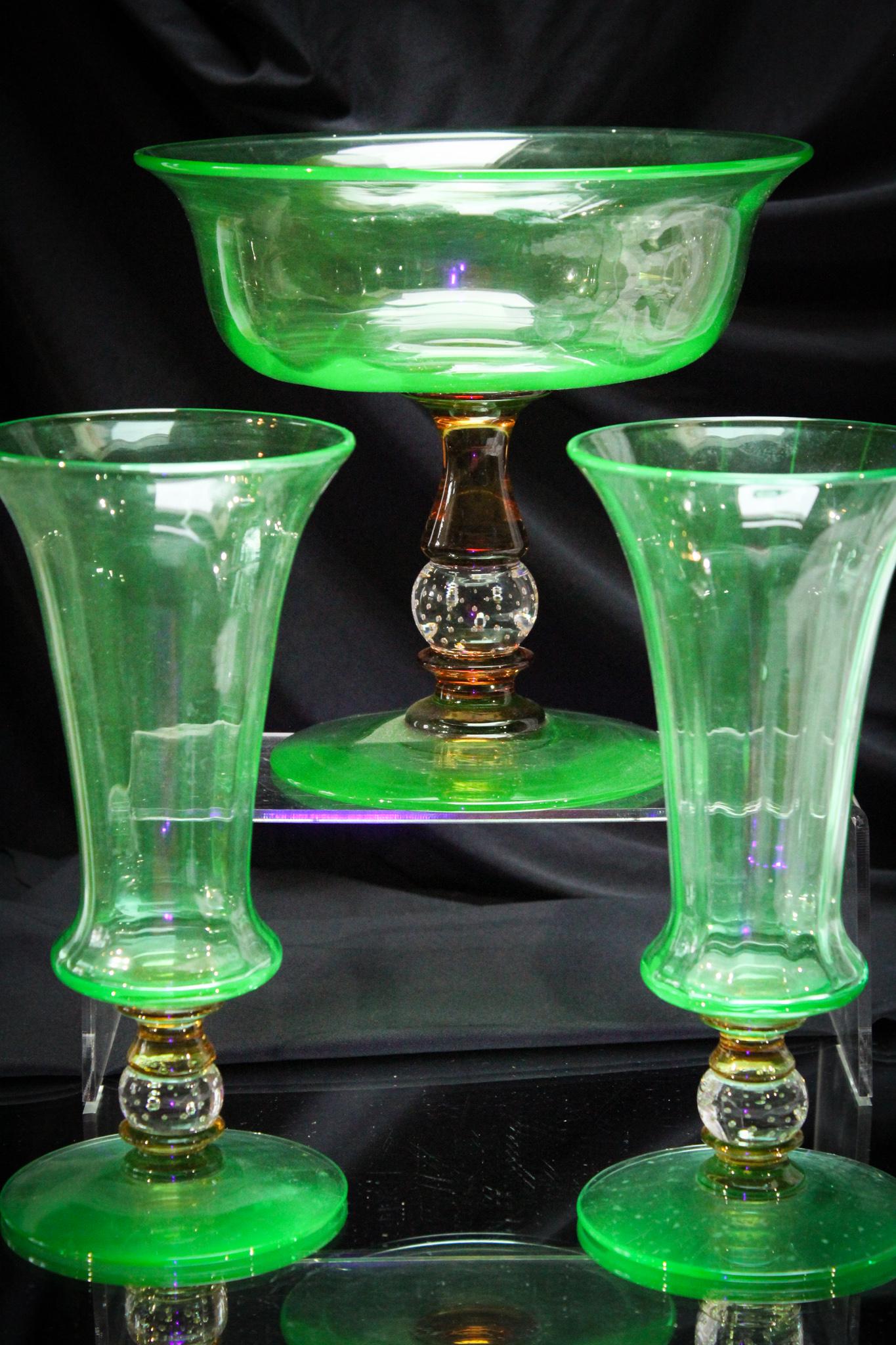 Pairpoint Green Amber Controlled Bubble 3 pc. Console Set: Wonderful attributed to Pairpoint three piece console set in amber & green with controlled bubble stem. Nice! Largest measures 9".