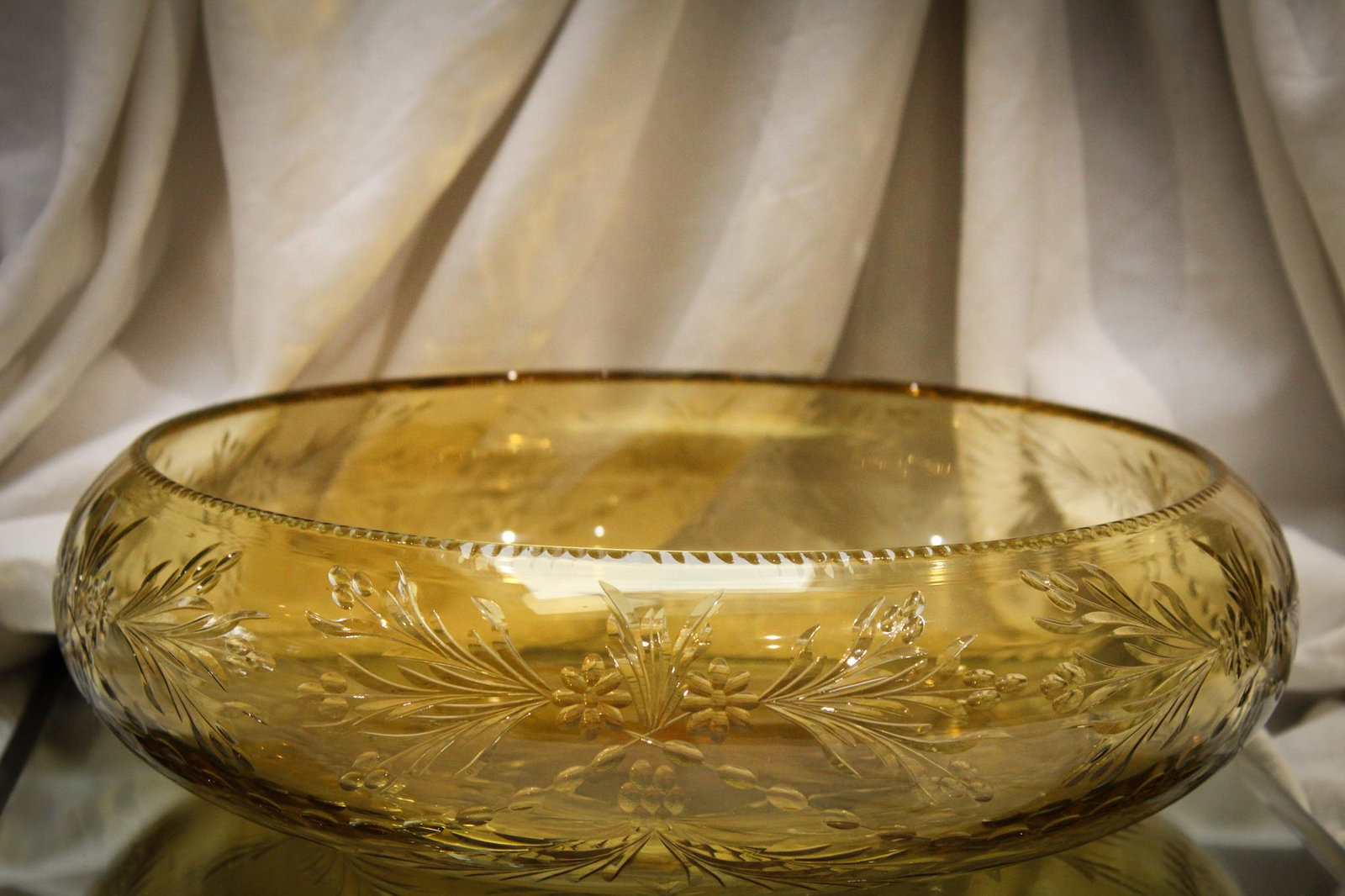 Pairpoint Glass Cut Amber 12" Console Bowl: Lovely attributed to Pairpoint large 12" by 3" light amber cut glass console bowl. Showy piece.
