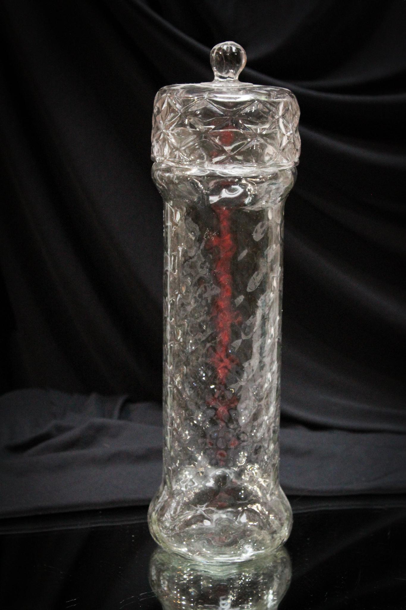 Victorian Expanded Diamond Quilt Glass Staw Jar: What a find this gem is and complete with the original lid! This Victorian straw jar has a blown expanded diamond pattern body and pressed expanded diamond original lid. Measures 12" tall.