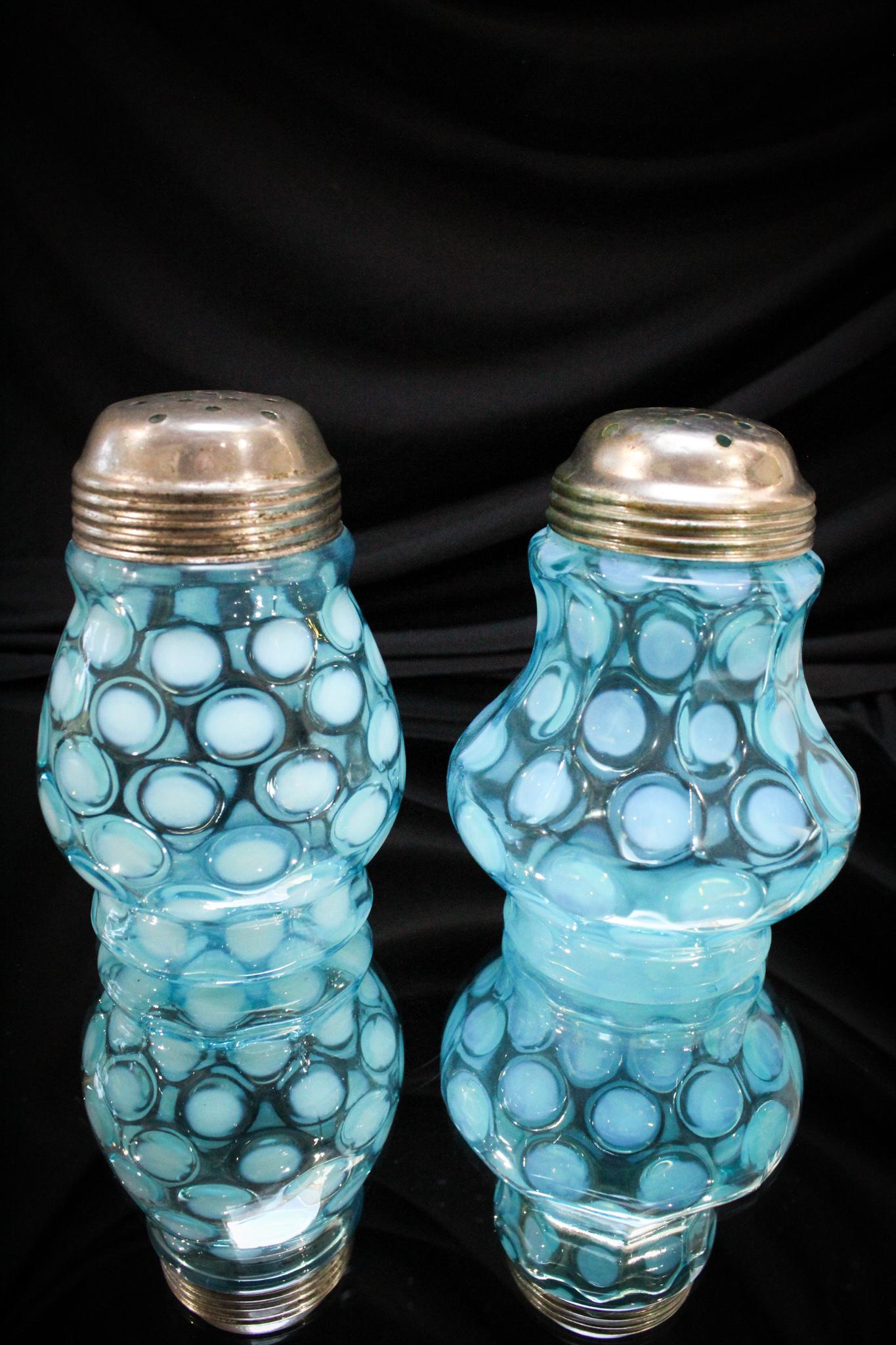 2 pc. Lot Victorian Opalescent Glass Sugar Shakers: Coin spot sugar shakers are a favorite among collectors, novice and advanced. These will suit the bill. One green and one blue example. So pretty. Tallest measures 4 3/4".
