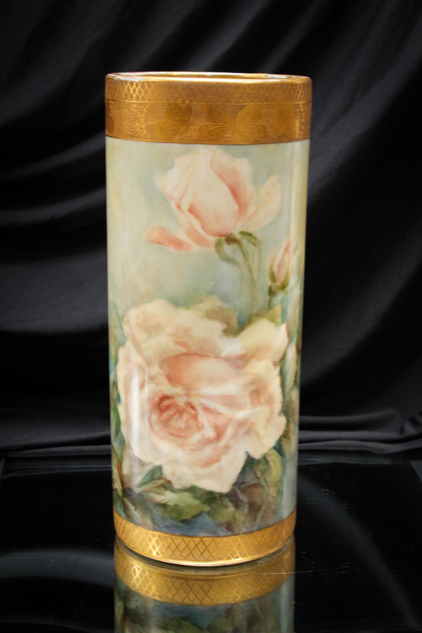 Hand Painted Roses Porcelain 12" Vase: Exceptional dÃ©cor of hand painted peach roses adorn this large 12" cylinder vase. Rich gold dÃ©cor adds to the beauty. The truest example of Victoriana.