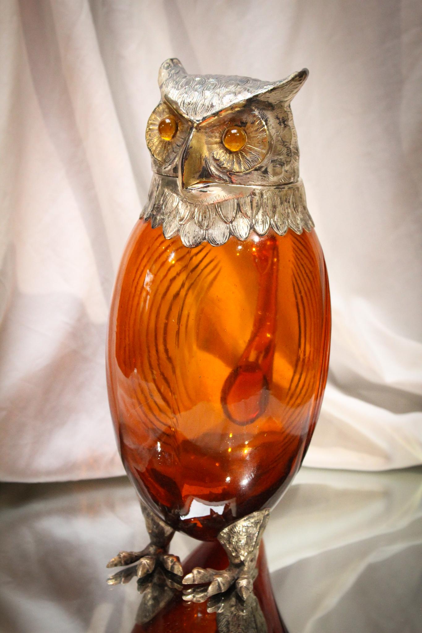 English Figural Root Beer Amber Owl Decanter: Fabulous root beer amber colored body on this super English figural owl decanter. Great showy example. Measures 11" tall.