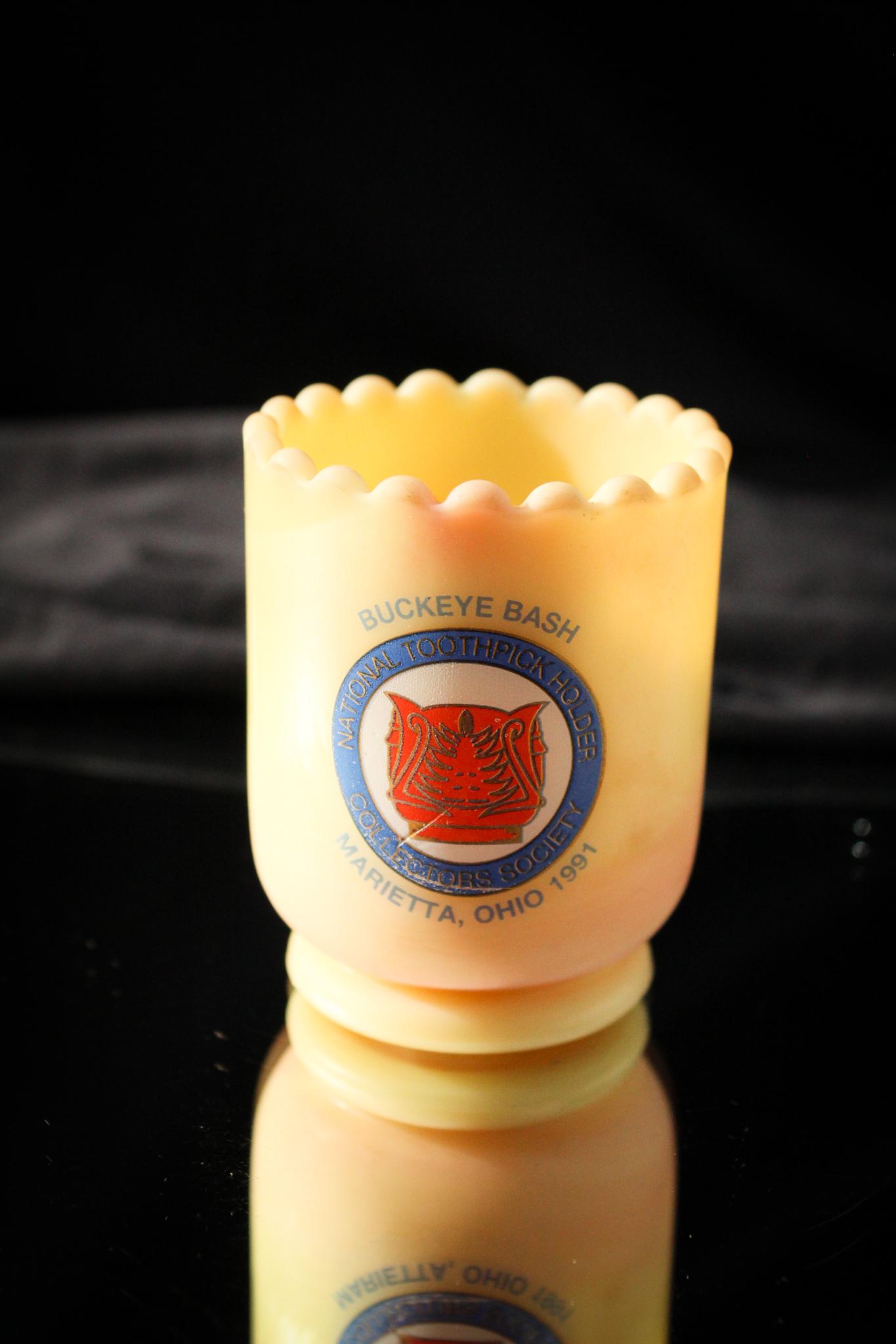 Fenton Glass Bill Heacock Collector Toothpick Holder: Here's a good one folks. A Fenton commemorative toothpick with a cameo of Bill Heacock on it in burmese glass. So tough. Measures 2 1/2" tall.