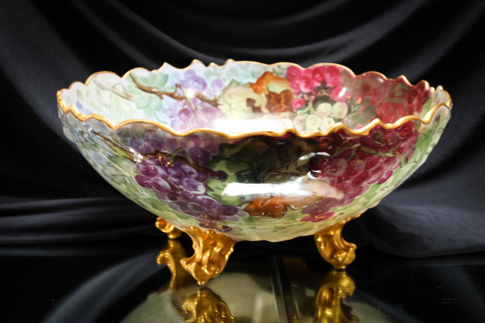 T & V Limoges Grape dÃ©cor Hand Painted Porcelain Punch Bowl: This is one phenomenal punch bowl decorated with hand painted grapes and foliage. This baby measures in at 6 1/2" tall and 14 1/2" in diameter.