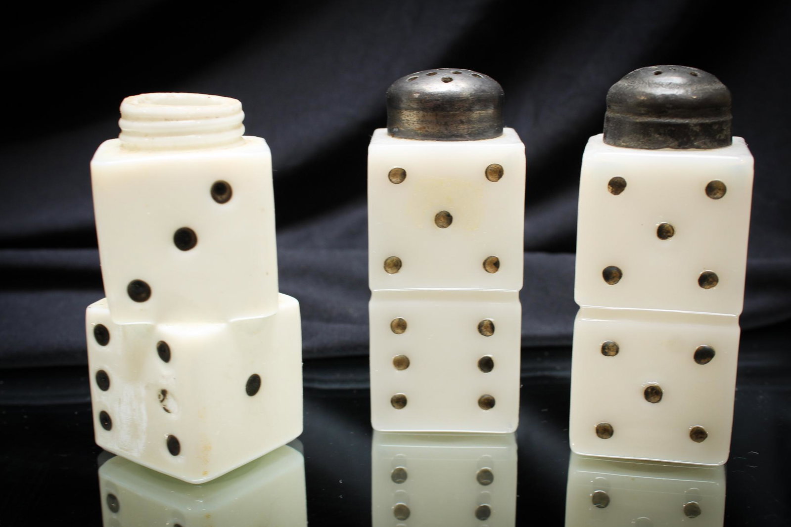 3 pc. Lot Victorian Glass Dice Shakers: Another great lot comprised of a pair and a single Victorian dice shakers. Roll the dice and take a chance on this lot. See if lady luck is on your side to win them! Tallest measures 3 1/2".