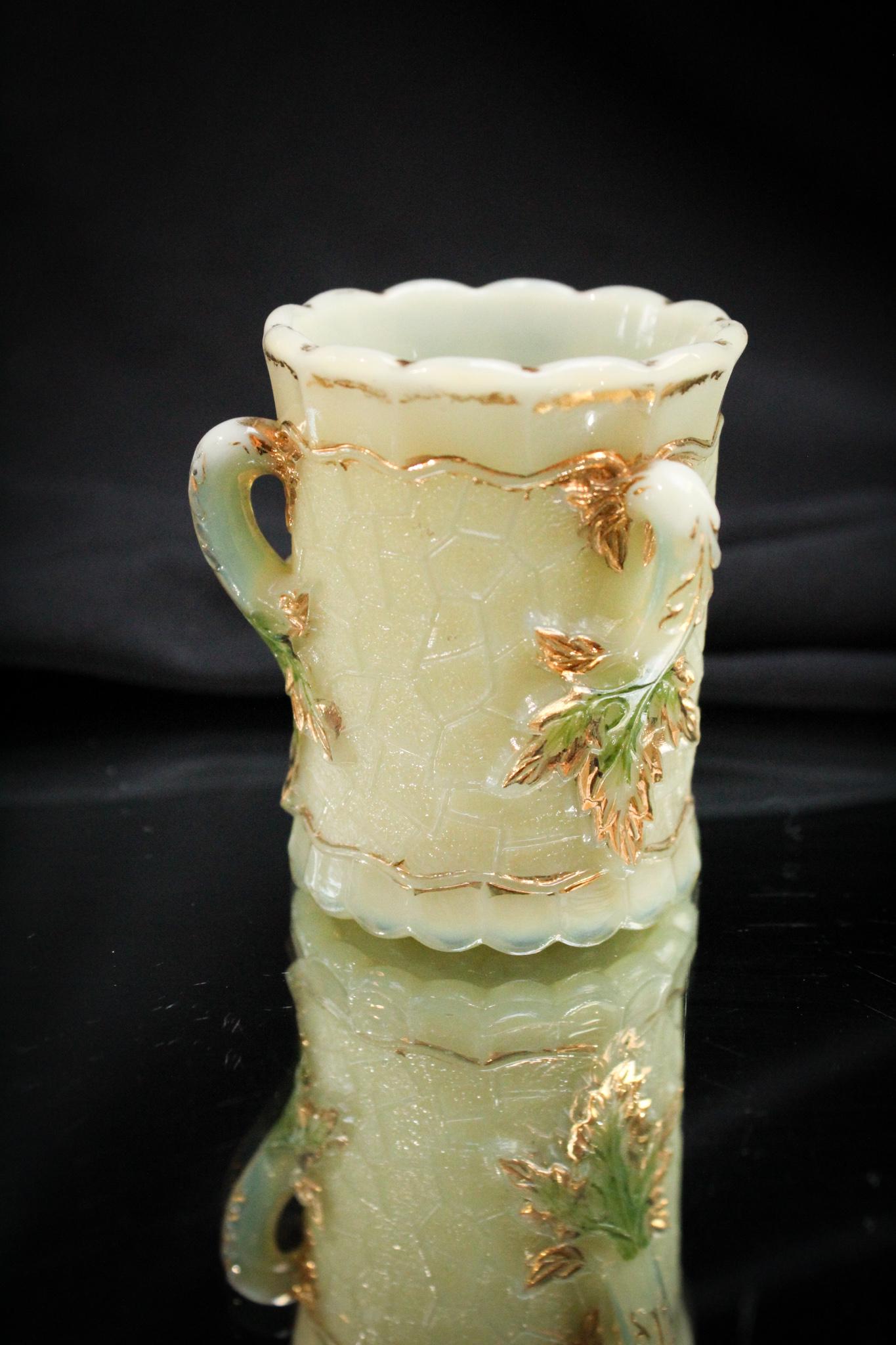 Northwood Custard Maple Leaf Victorian Toothpick Holders: Now folks, this toothpick is a goodie don't you know. Yes, the custard Maple Leaf pattern has a few rare forms. This one used to be classified as that. A little more easily accessible now if you hunt