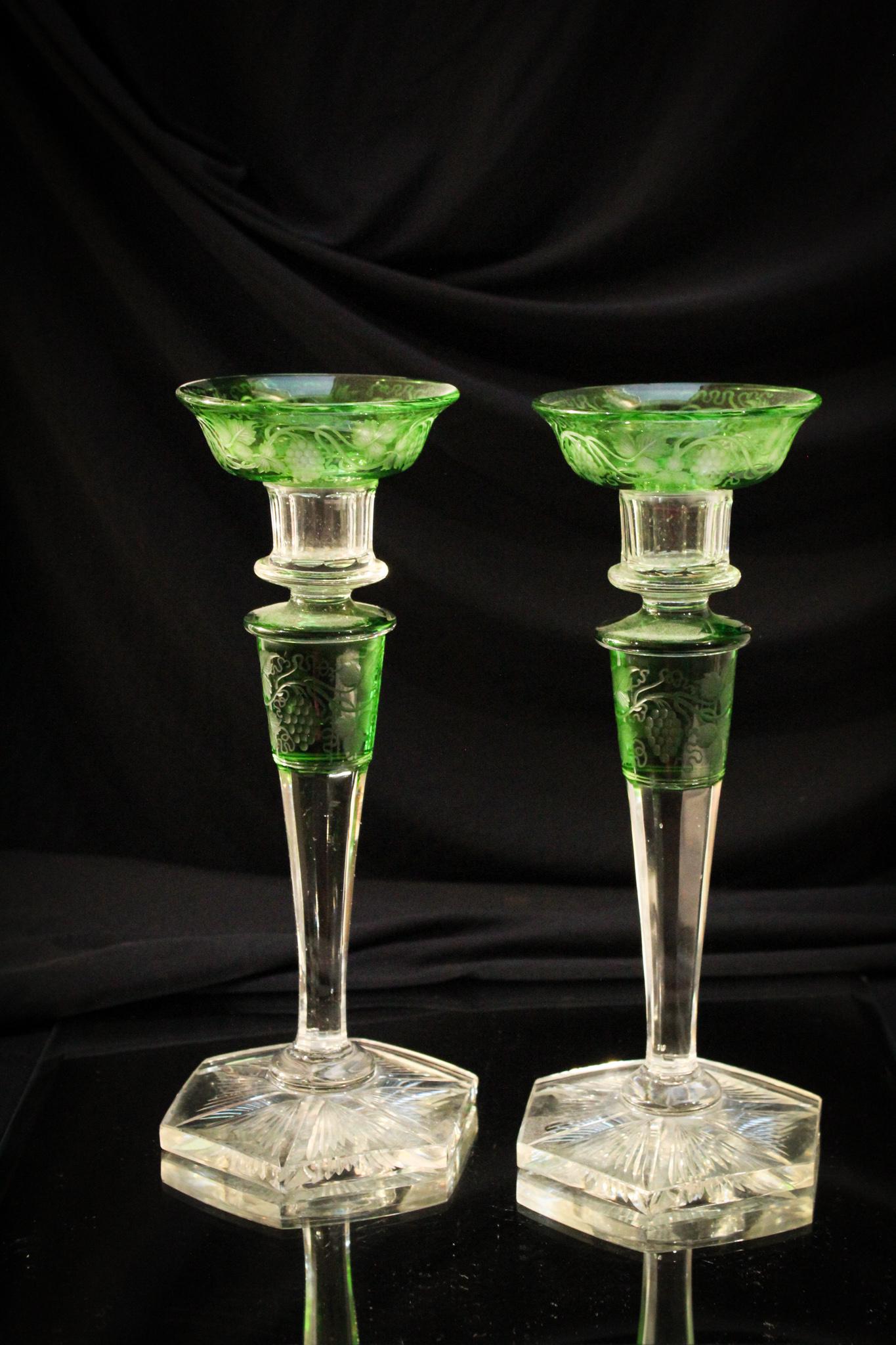 Green to Clear Engraved Grapes 10" Candlesticks: Very pretty with the green and clear coloring to these candlesticks. These are engraved with grape dÃ©cor. Attractive size as well.