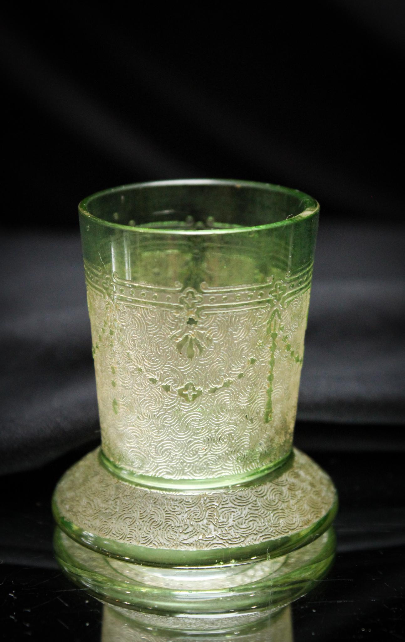 St. Louis Etched Victorian Glass Toothpick Holder: Such a nice example. This toothpick attributed to St. Louis is in green to clear and is footed. It measures 2 1/8" tall.