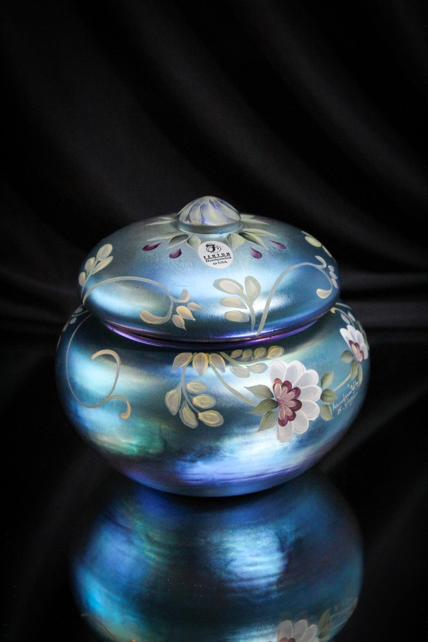 Fenton Art Glass Faverene Ltd Ed. Jar: Look at the scrumptious coloring of this rare and desirable piece of Fenton Art Glass. Nothing but the best at Magnum Auctions. This gem measures 4" tall.